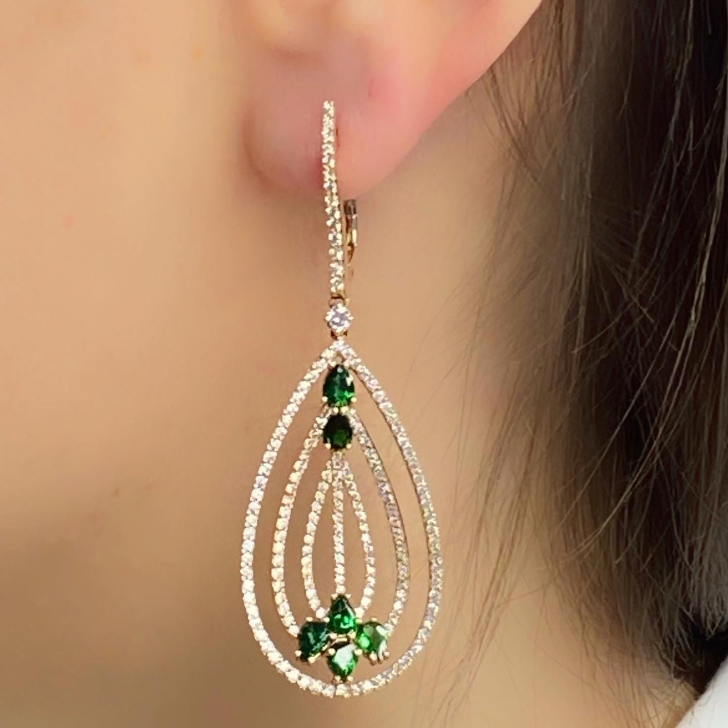 These RADIOSA dangling earrings are a versatile choice, allowing for movement and adding dynamic flair to any outfit. They can be the perfect statement piece for special occasions or add a touch of elegance & colour to everyday wear.
Tzavorite is a