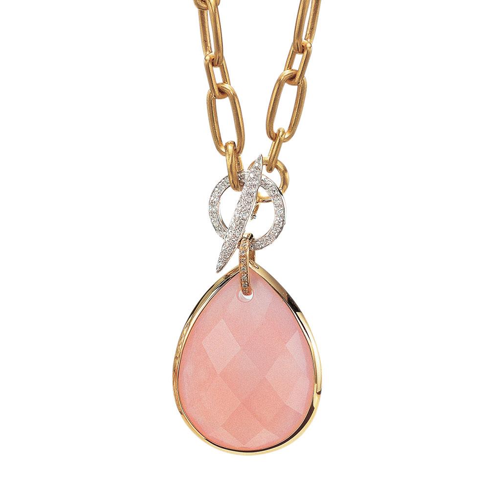 This lovely 18 karat rose gold necklace features a multi faceted pear shaped Rose Quartz  bezel set drop. It hangs from a rose gold open link 18