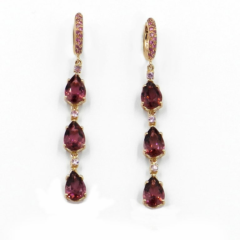 18KT Rose Gold great quality and color pink tourmalines drops with pink sapphires pavè , and a pink sapphires pave top huggie. 
made in Italy by GARAVELLI 
Earrings Lenght  mm.58 
GOLD gr : 5,50
PINK SAPPHIRES ct  : 0,48
DROP SHAPE PINK TOURMALINES
