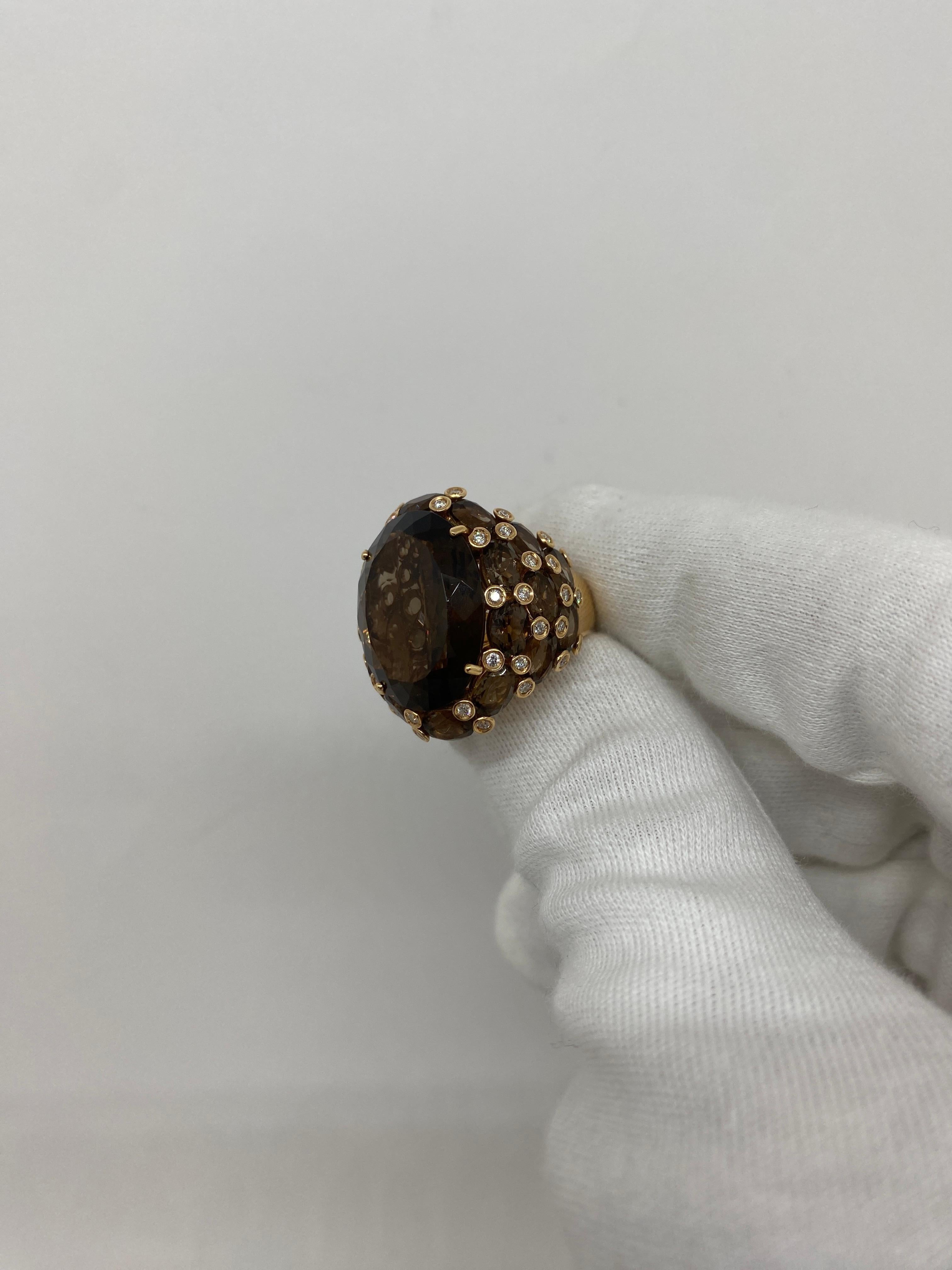 Ring made of 18kt rose gold with fume quartz and white brilliant-cut diamonds for ct.0.49

Welcome to our jewelry collection, where every piece tells a story of timeless elegance and unparalleled craftsmanship. As a family-run business in Italy for