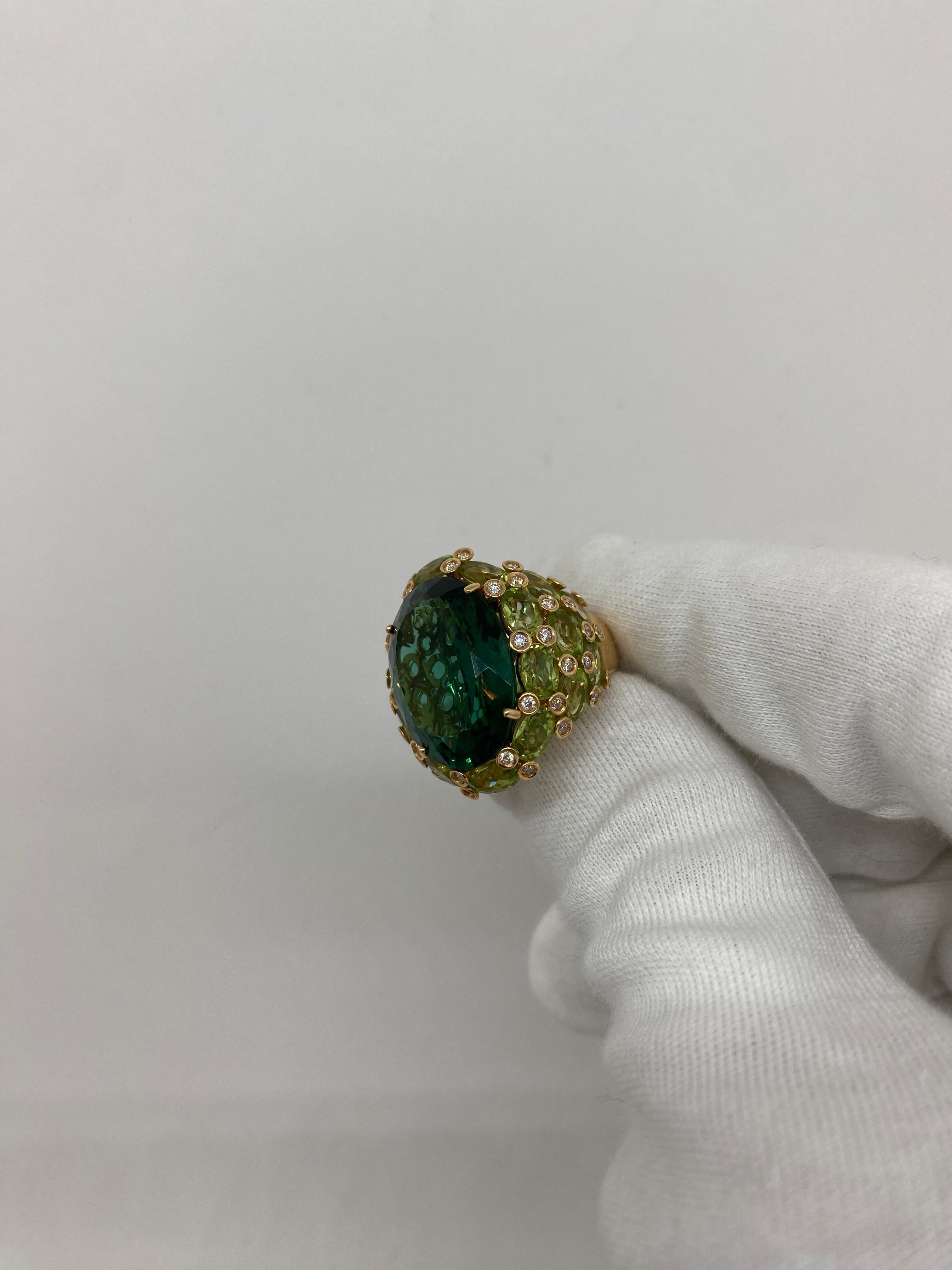Ring made of 18kt rose gold with oval-cut green quartz and natural white brilliant-cut diamonds for ct.0.49 and peridot

Welcome to our jewelry collection, where every piece tells a story of timeless elegance and unparalleled craftsmanship. As a