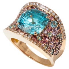 18kt rose gold ring with turquoise & pink gemstones a unique cushion cut zirkon