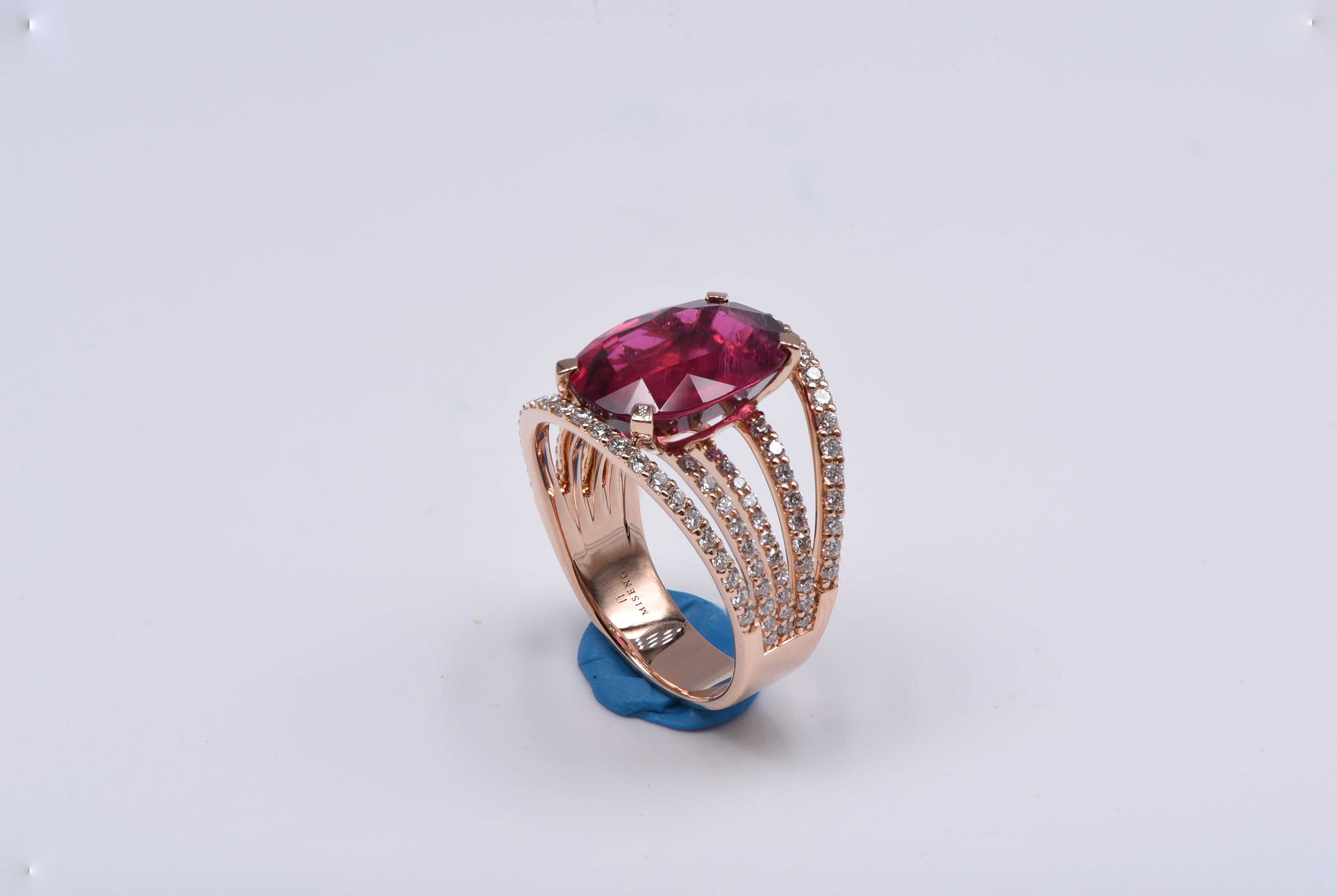 18kt rose gold ring with white diamonds (approx. 1.14 carats) and oval shaped rubellite (approx. 6.74 carats) center stone