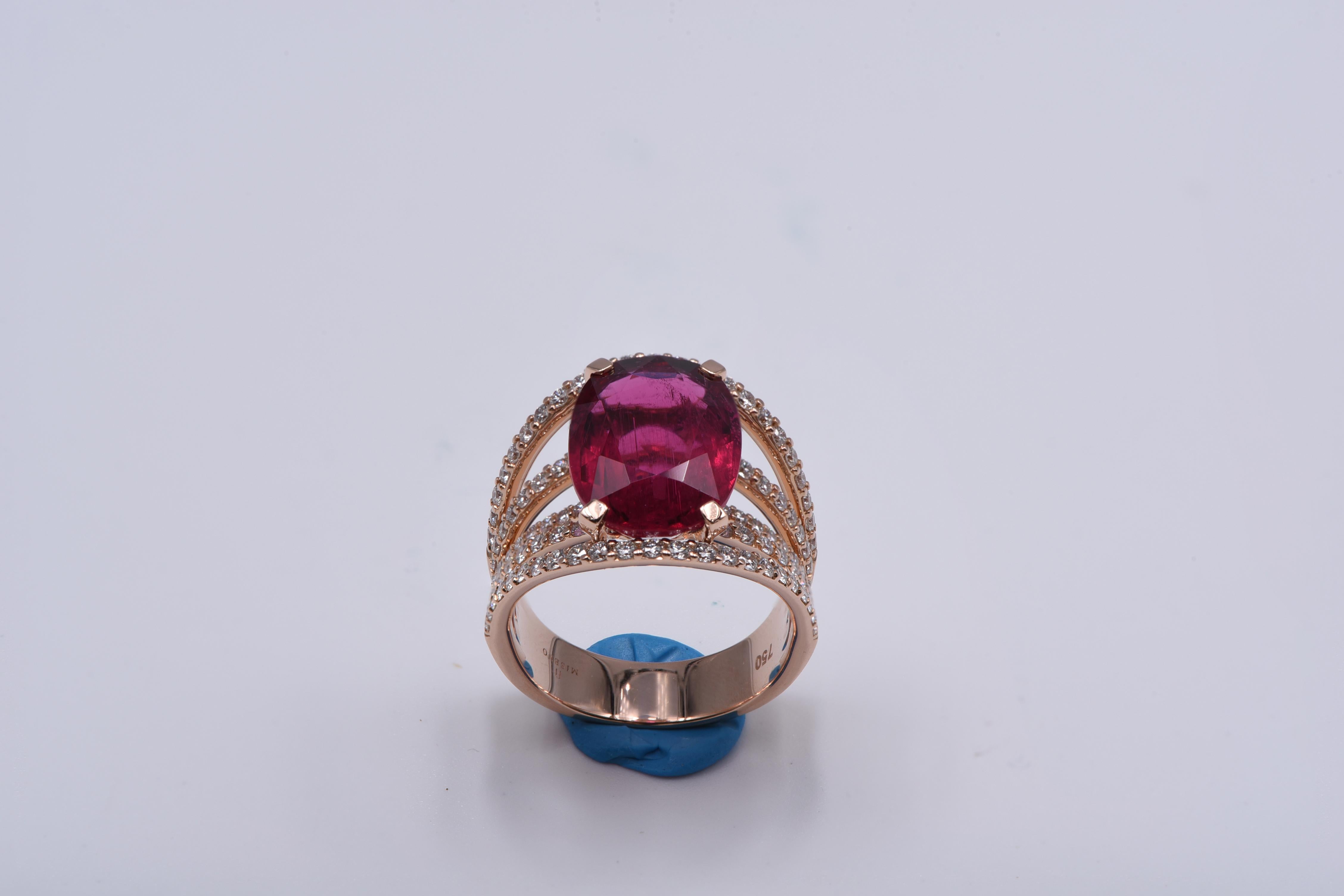 Round Cut 18kt Rose Gold Ring with White Diamonds and Oval Shaped Rubellite Center Stone For Sale
