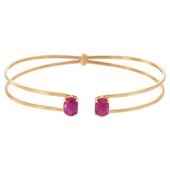 Brazalete doble flexible de oro rosa de 18 quilates con rubíes