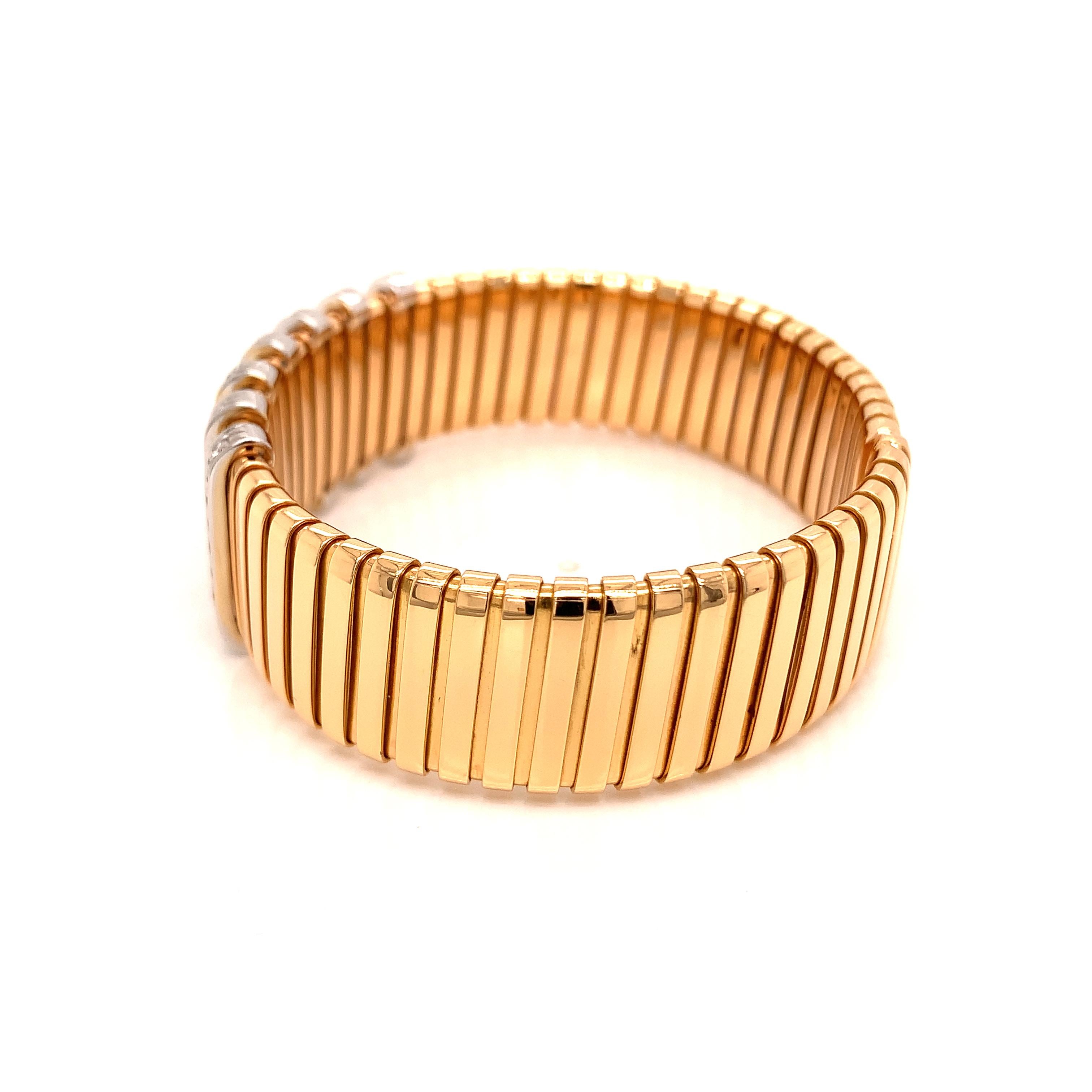 On sale on First Dibs only for 3 week.  This beautiful ring is a stunning piece created in Valenza.
An Italian  18kt Rose Gold Bracelet with Diamond Stations . Flat Large  tubogas with 7white gold diamonds stripes 
Wrist size 16cm,  inches 6.30. 