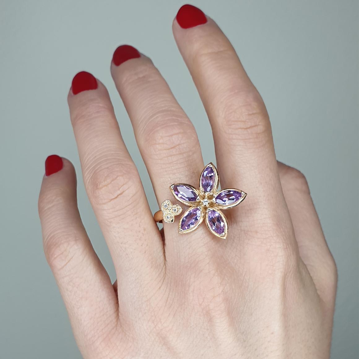 Ring in 18k rose gold with Amethyst (marquise cut, size: mm) and white Diamonds cts0.07 VS colour G/H. 

Size of ring: 15 EU  - 7,5 USA    g. 6.10
(Possibility to have earrings in set)

All Stanoppi Jewelry is new and has never been previously owned