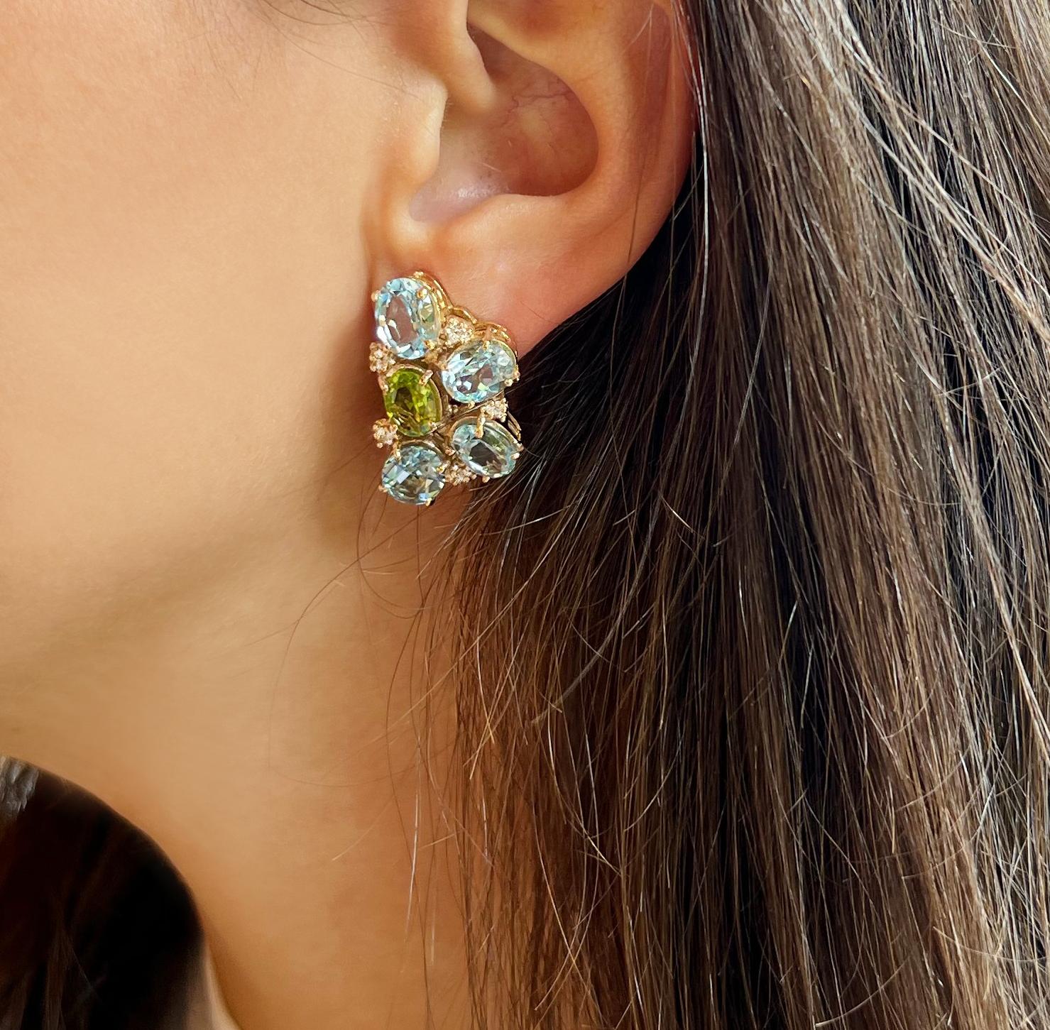 18Kt Rose Gold with blue topaz, Peridots Stones White Diamonds Amazing Modern Earrings 
Stones:  Oval cut mm 7x9    g.18,30  white diamonds cts 0.18
 Delicate mix of colors for this modern earrings in rose gold made in Italy by Stanoppi Jewellery
