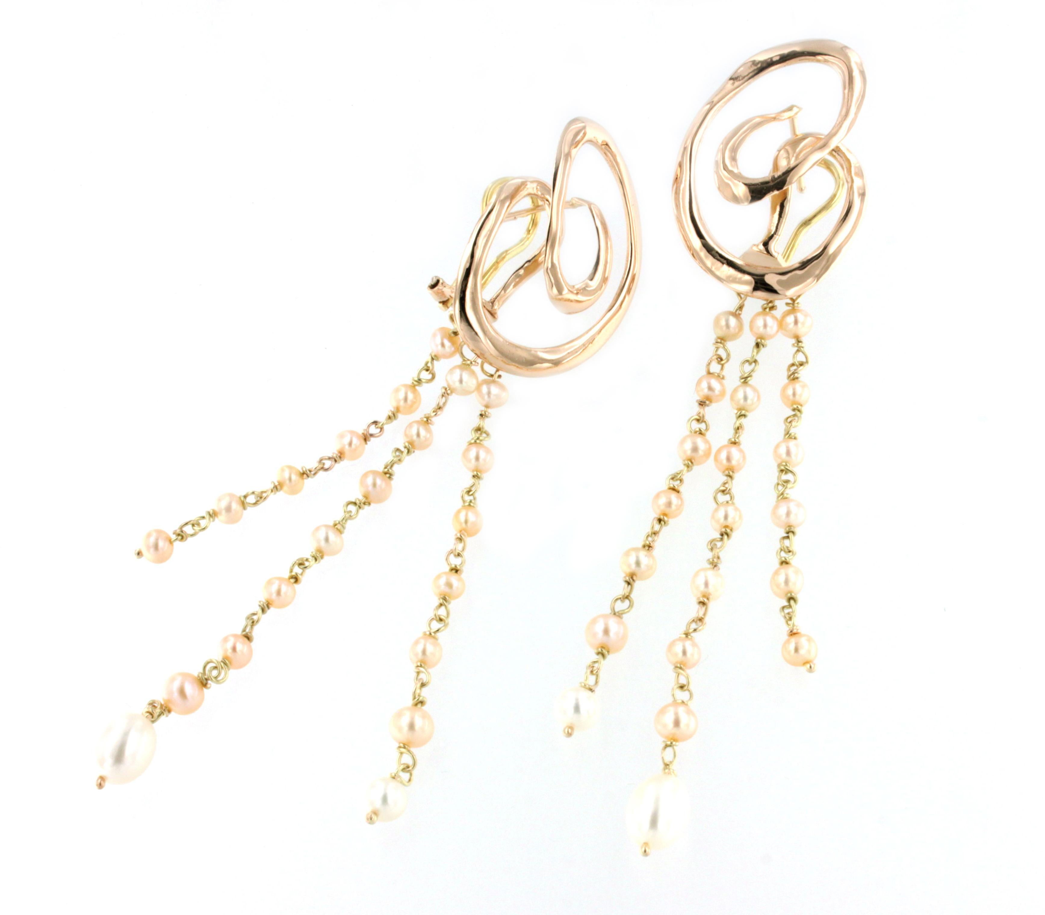 Moderne, élégant, boucles d'oreilles pendantes en or blanc 18kt, avec des perles . Fabriqué à la main en Italie par Stanoppi Jewellery depuis 1948. Tous nos bijoux sont fabriqués uniquement dans notre laboratoire par des orfèvres experts.

Longueur