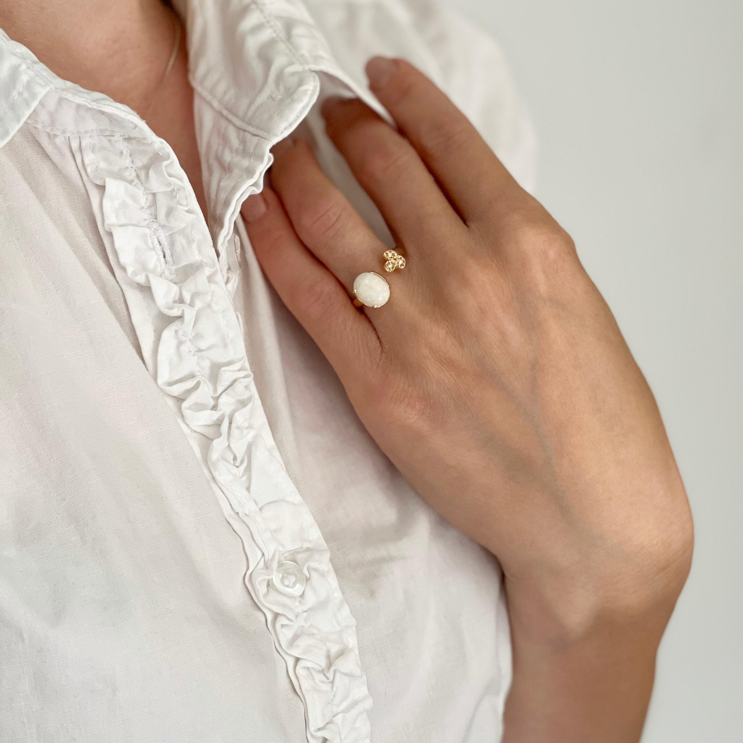 Shiny white opal , design and craftmanship handmade in Italy by Stanoppi Jewellery since 1948.
Ring in 18k rose gold with opal (oval cabochon cut, size: 8x10mm) and white Diamonds cts 0.06 VS colour G/H. g.4.00
the Ring is in 18kt gold with natural