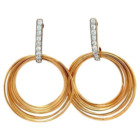 Boucles d'oreilles cercle en or rose et blanc 18Kt avec diamants - 0.34 cts en vente