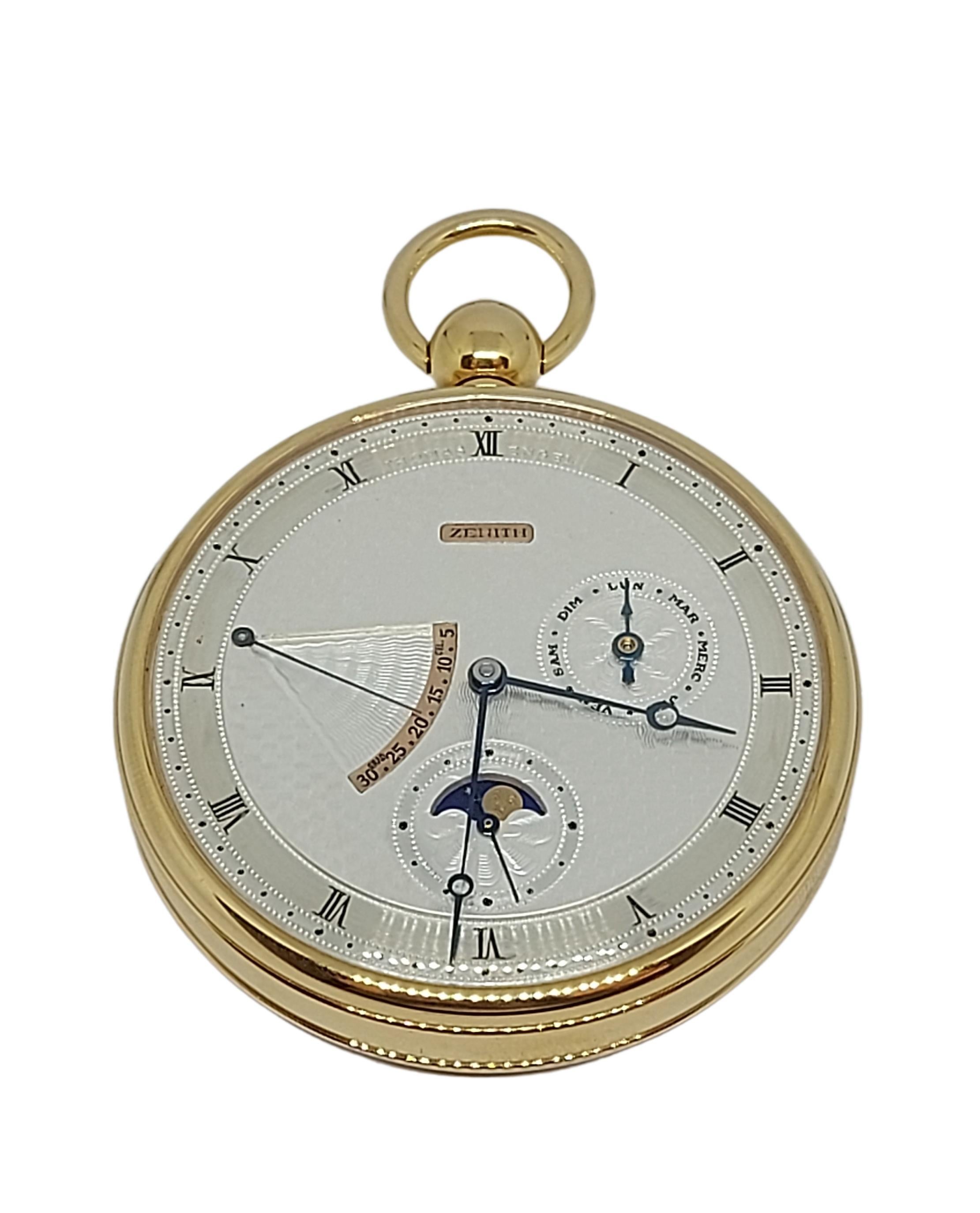 18kt Rose Zenith Open Face Pocket Watch Thomas Engel No° 9 With Box & Papers!

Limited Edition !

Movement: Mechanical Hand winding

Functions: Hours, minutes, small seconds, moon phases, days of the week, thermometer. 

Case: 18kt Rose gold