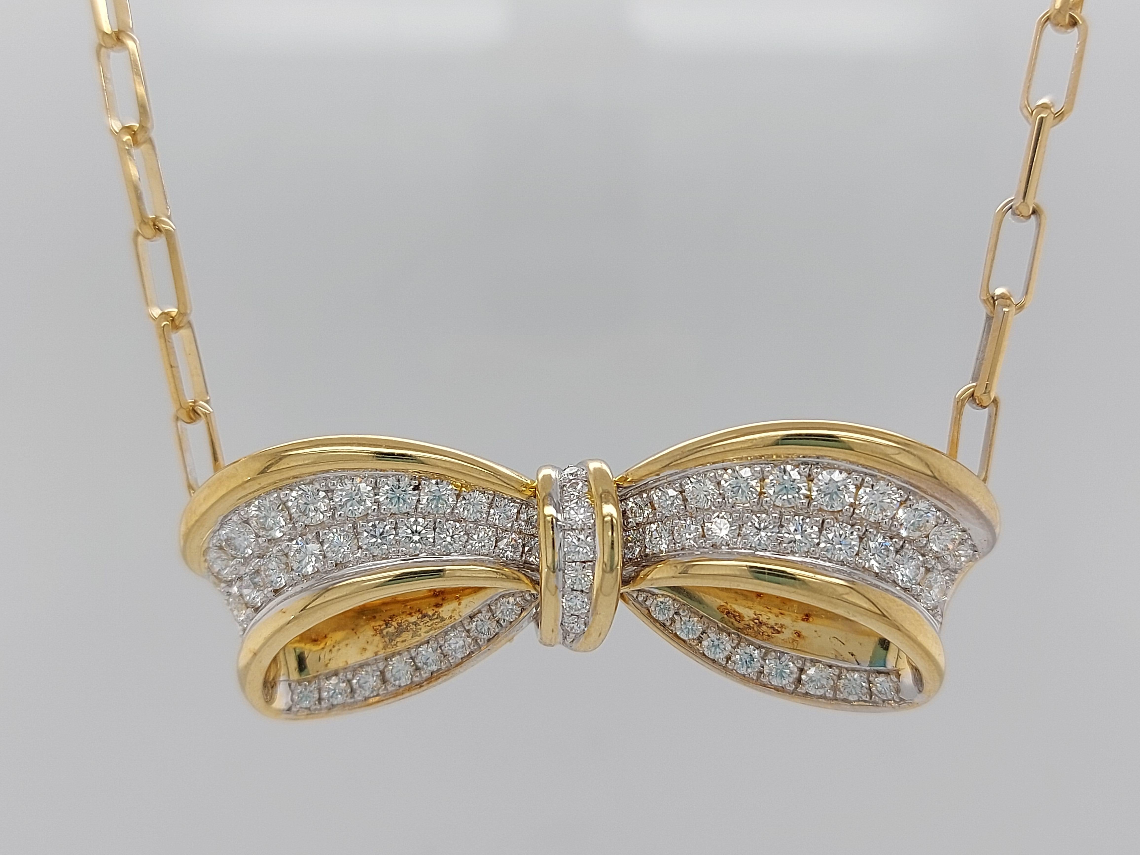 Stunning 18kt Solid Yellow and White Gold Bow Necklace With Diamonds 

Diamonds : Brilliant cut diamonds 2,05 ct top quality cut and color E/F Internally flawless/VVS

Material : 18kt solid yellow gold

Total Weight : 26.5 gram / 17 dwt / 0.930