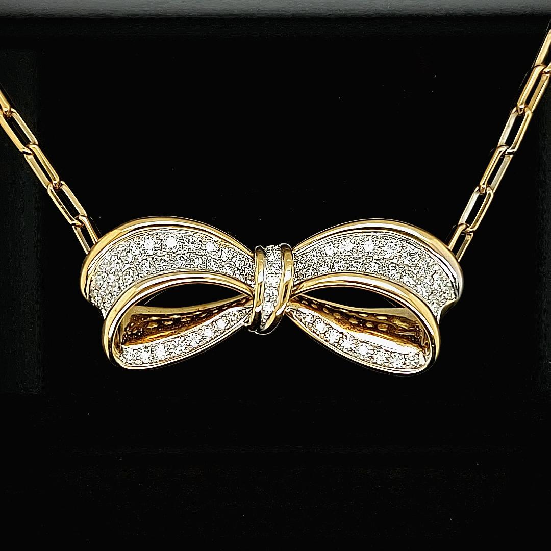 bow necklace gold