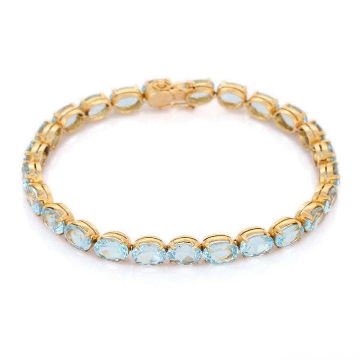 Bracelet tennis en or jaune massif 18 carats avec topaze bleue facettée de 28,5 carats en vente 1