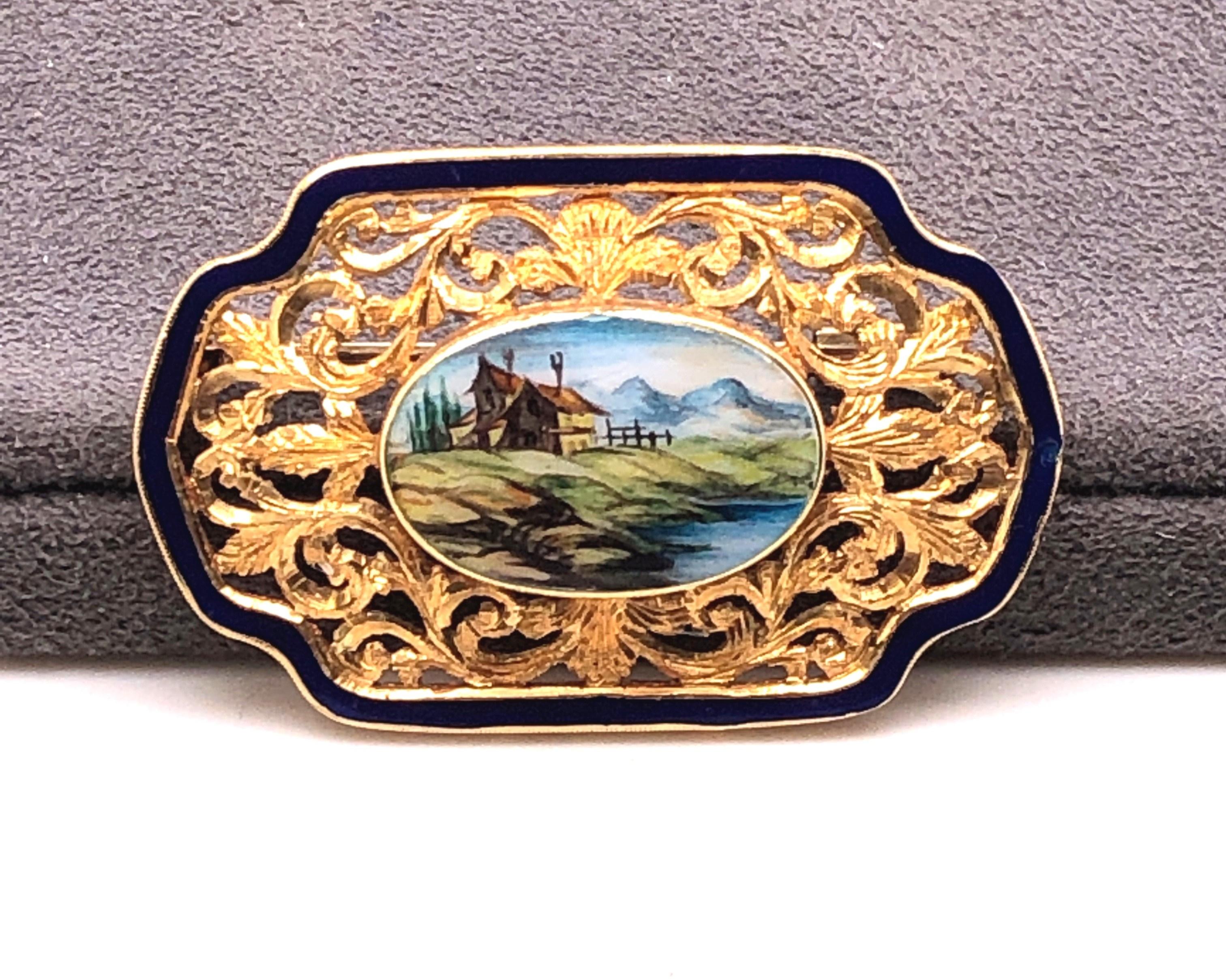 18kt yellow gold Swiss Sylvan Setting Enamel Brooch with Cobalt blue enamel Surround.

This brooch is Victorian and the original patina has been left on the reverse.
