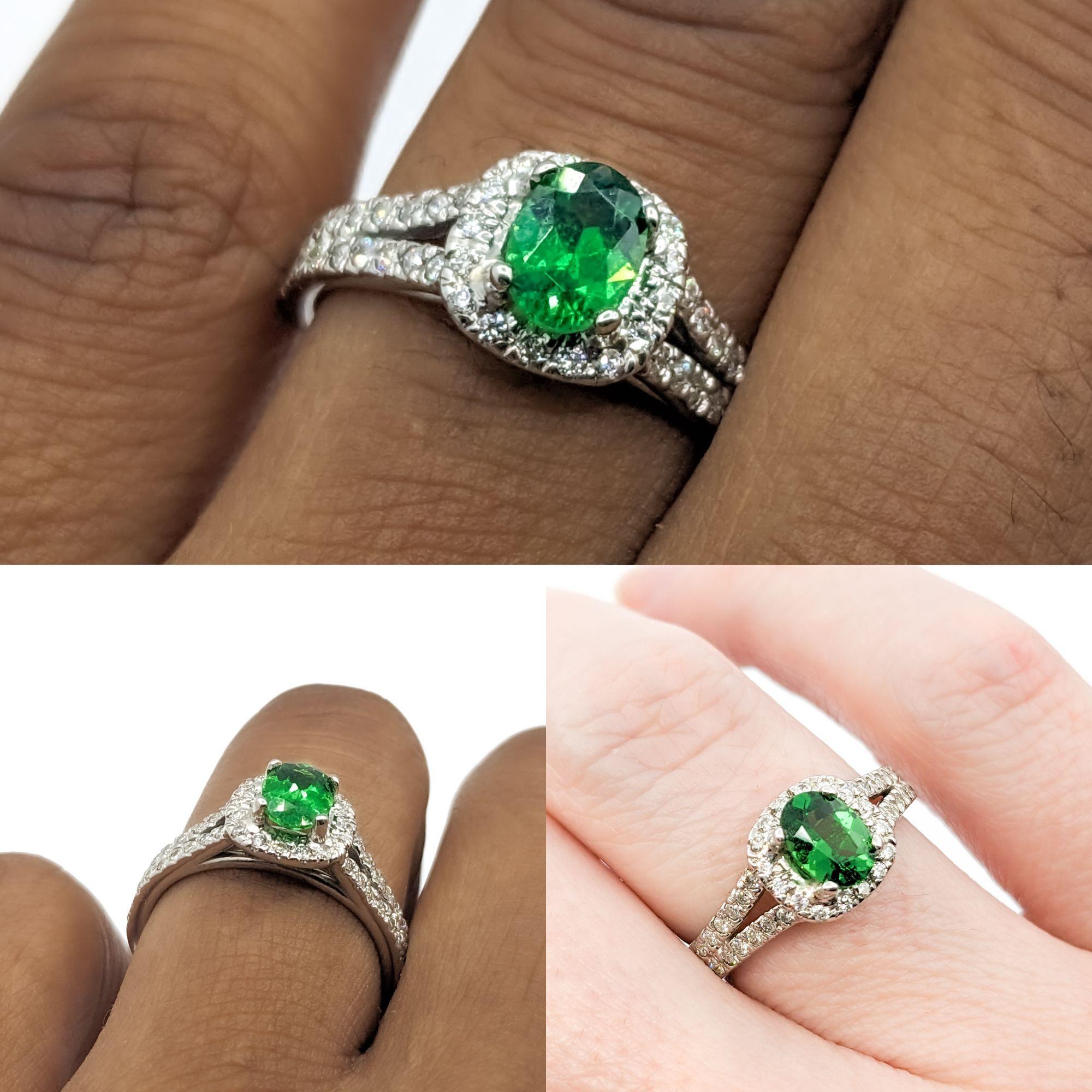 18kt Tsavorite Garnet & Diamond Ring

This stunning ring is expertly crafted from 14kt white gold and adorned with 0.50 carats total weight of glittering diamonds that boast an SI2 clarity grade and an H color grade. Additionally, the ring showcases