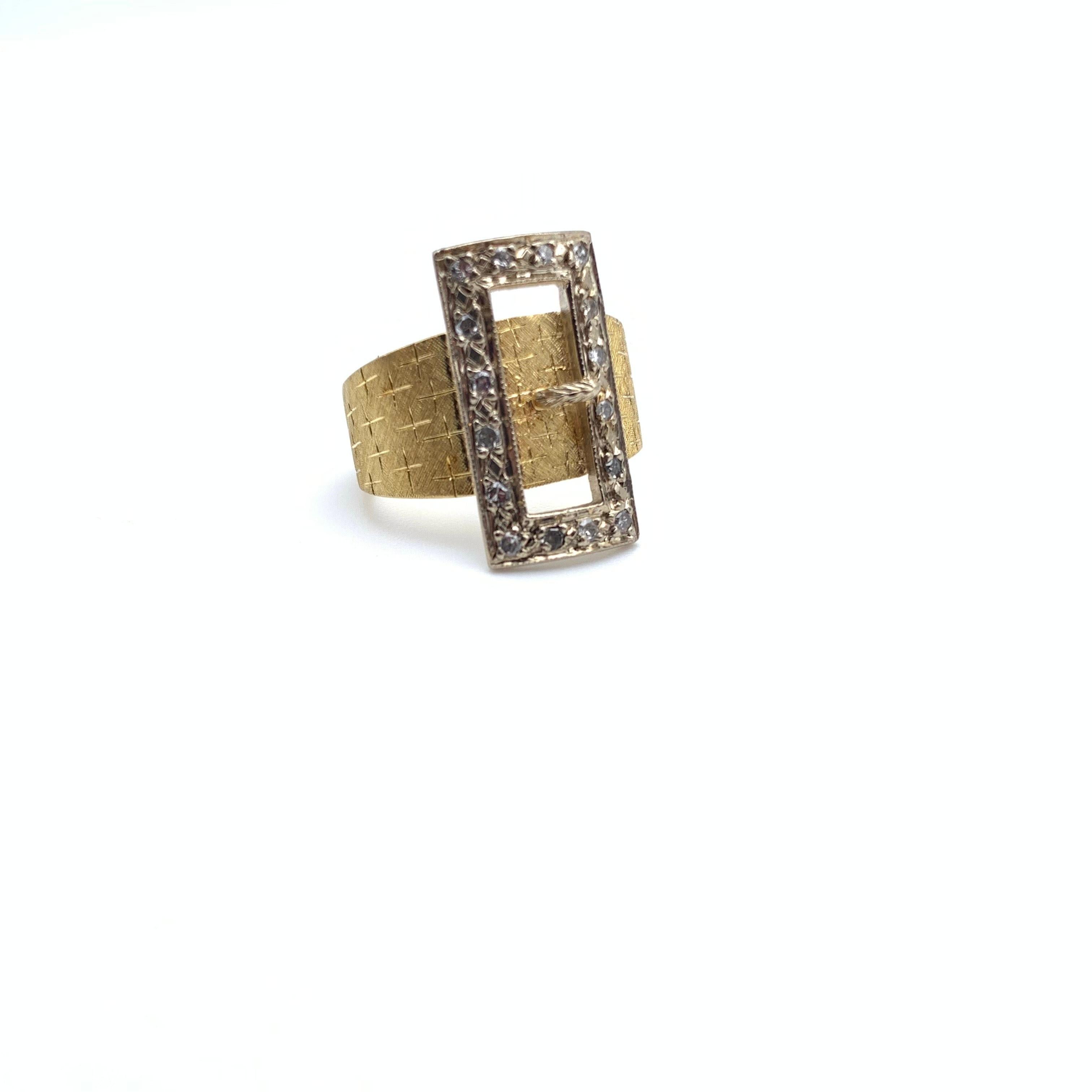 This ring is full of detail and character! It is most likely from the 1950s-60s and set in 18-karat two-toned gold. The piece features hand-engraved detail work 360 degrees around the shank. The ring is prong-set with 16 round diamonds measuring