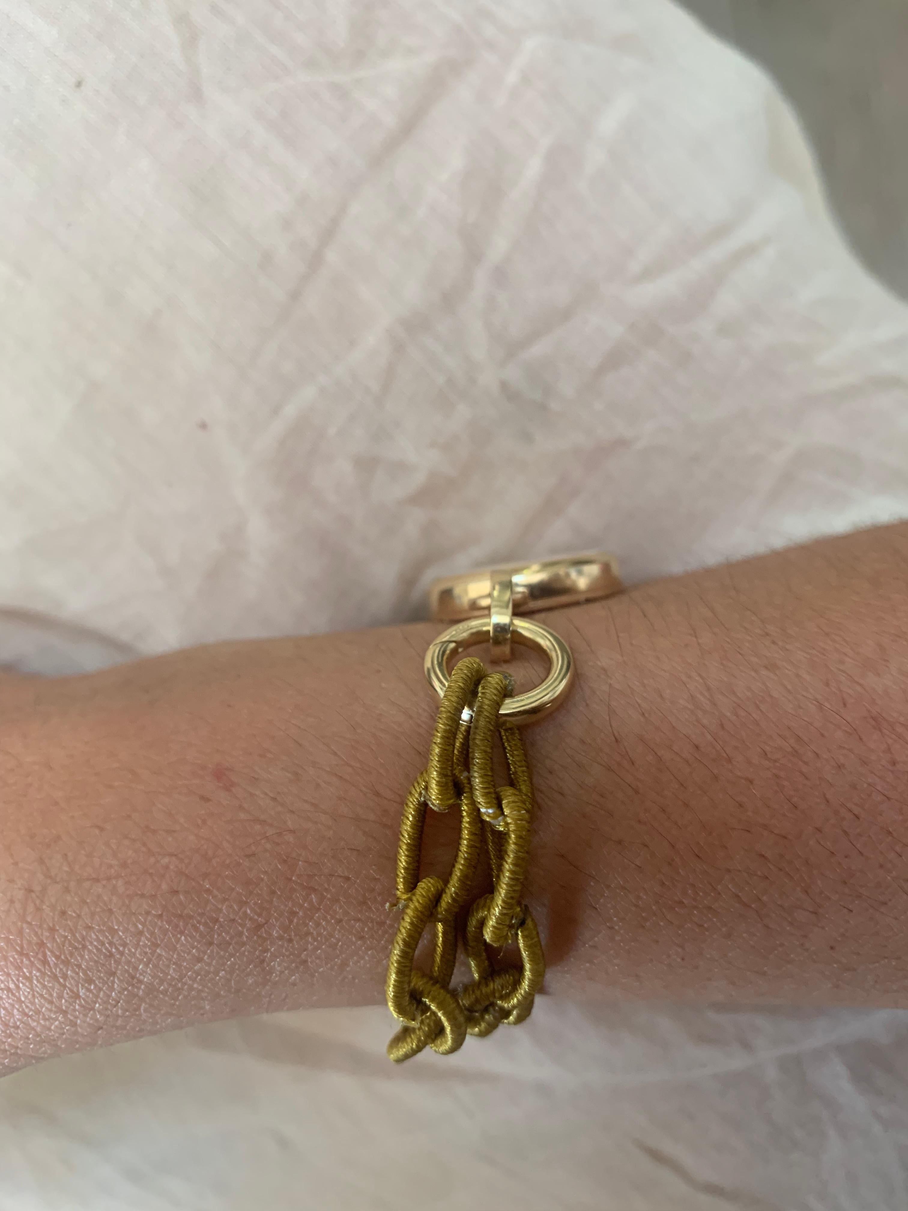 Contemporary 18kt Warm Gold non-time-telling timepiece Bracelet with silk and openable clasps For Sale