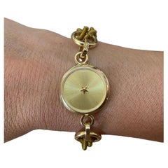 Bracelet de montres à remontage automatique en or chaud 18 carats avec fermoirs en soie et fermoirs ouverts
