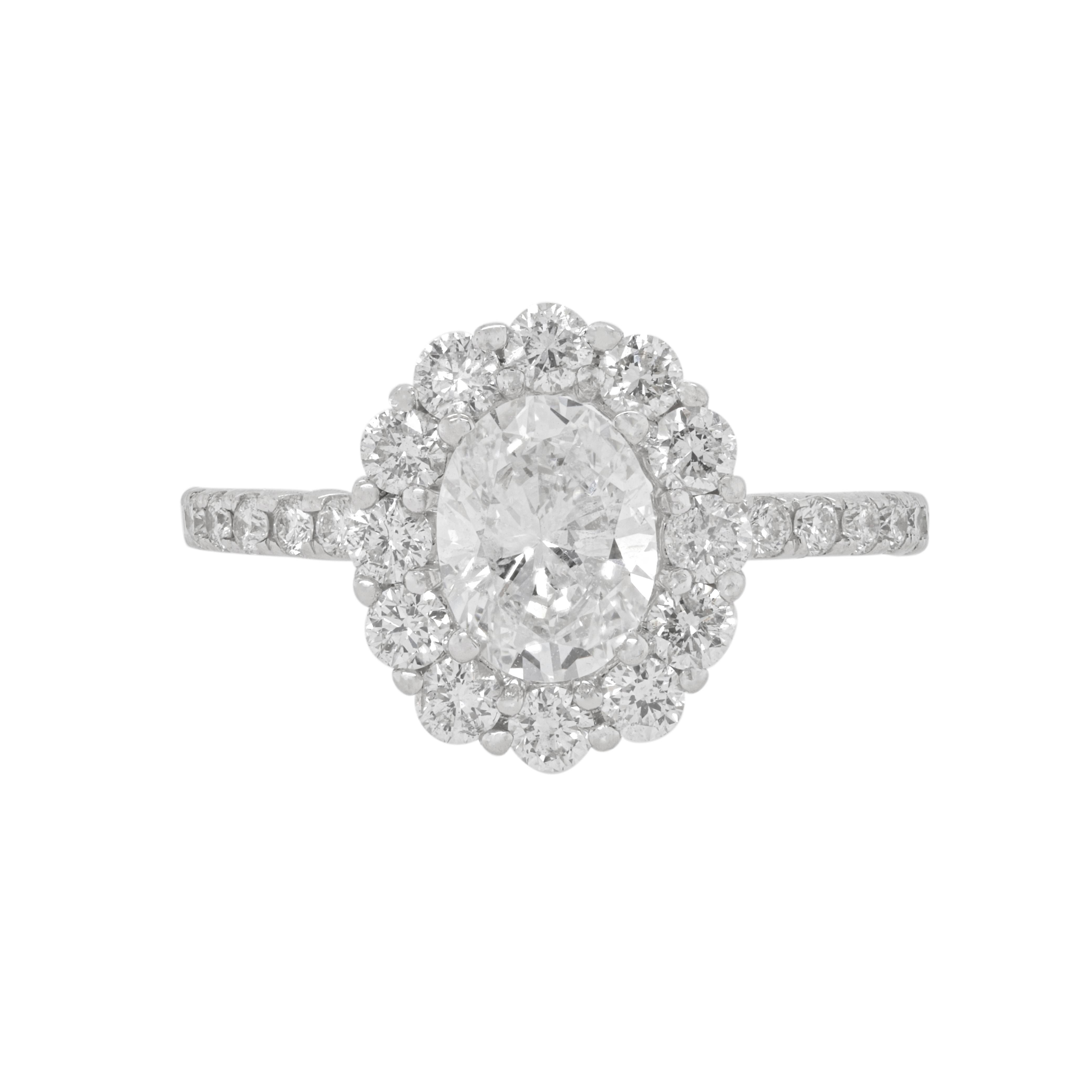 Oval Cut 18K White Gold Ring with 0.78cts Oval Center Stone and 0.85cts Round Diamonds For Sale