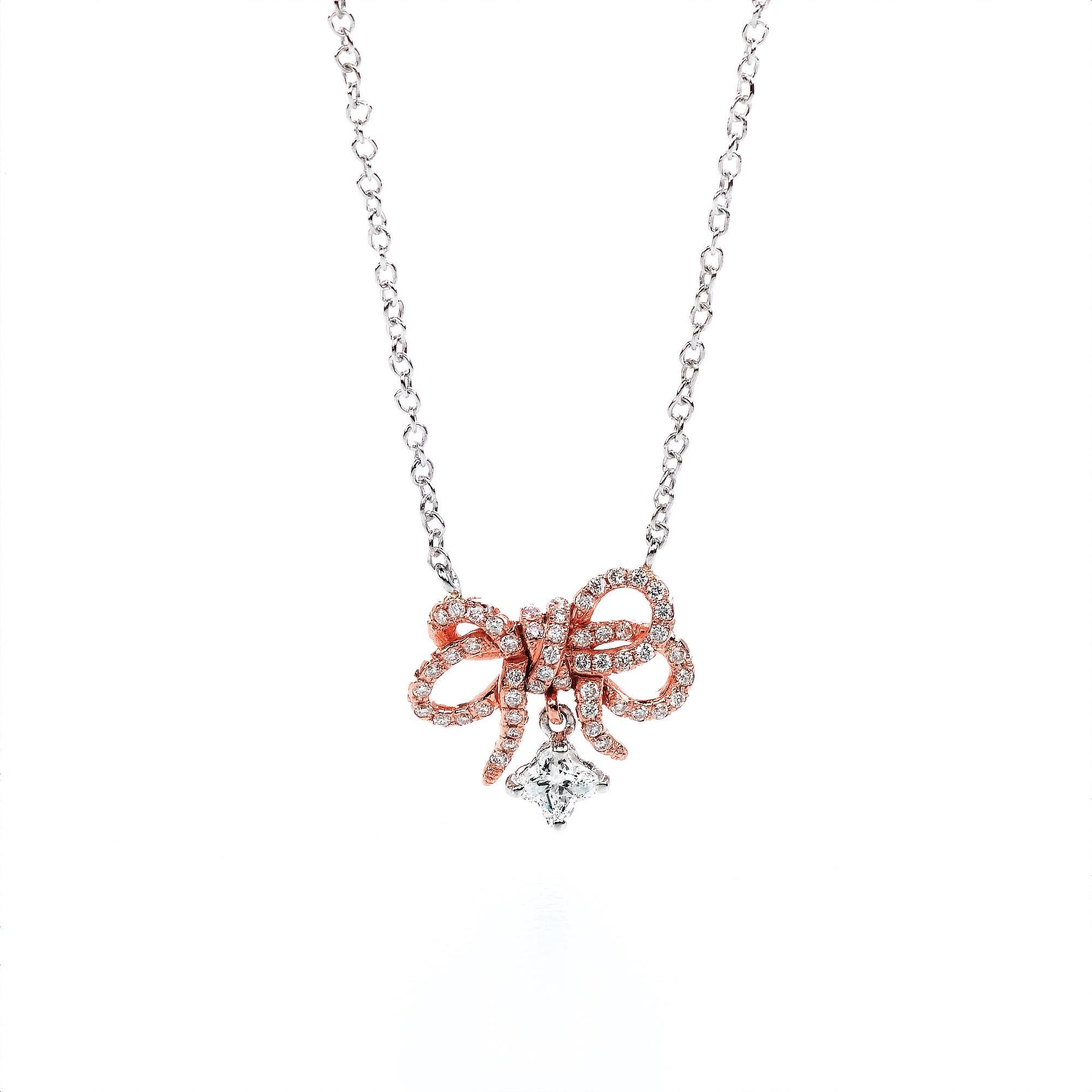 18KT white and rose gold bouquet  diamond flower necklace.  .1 LILY CUT ® flower shape diamond H color VS SI clarity  0.18 cts . additional 0.28 ct round diamond accent .Overall size 17 inch necklace with a link to make 16 inch .