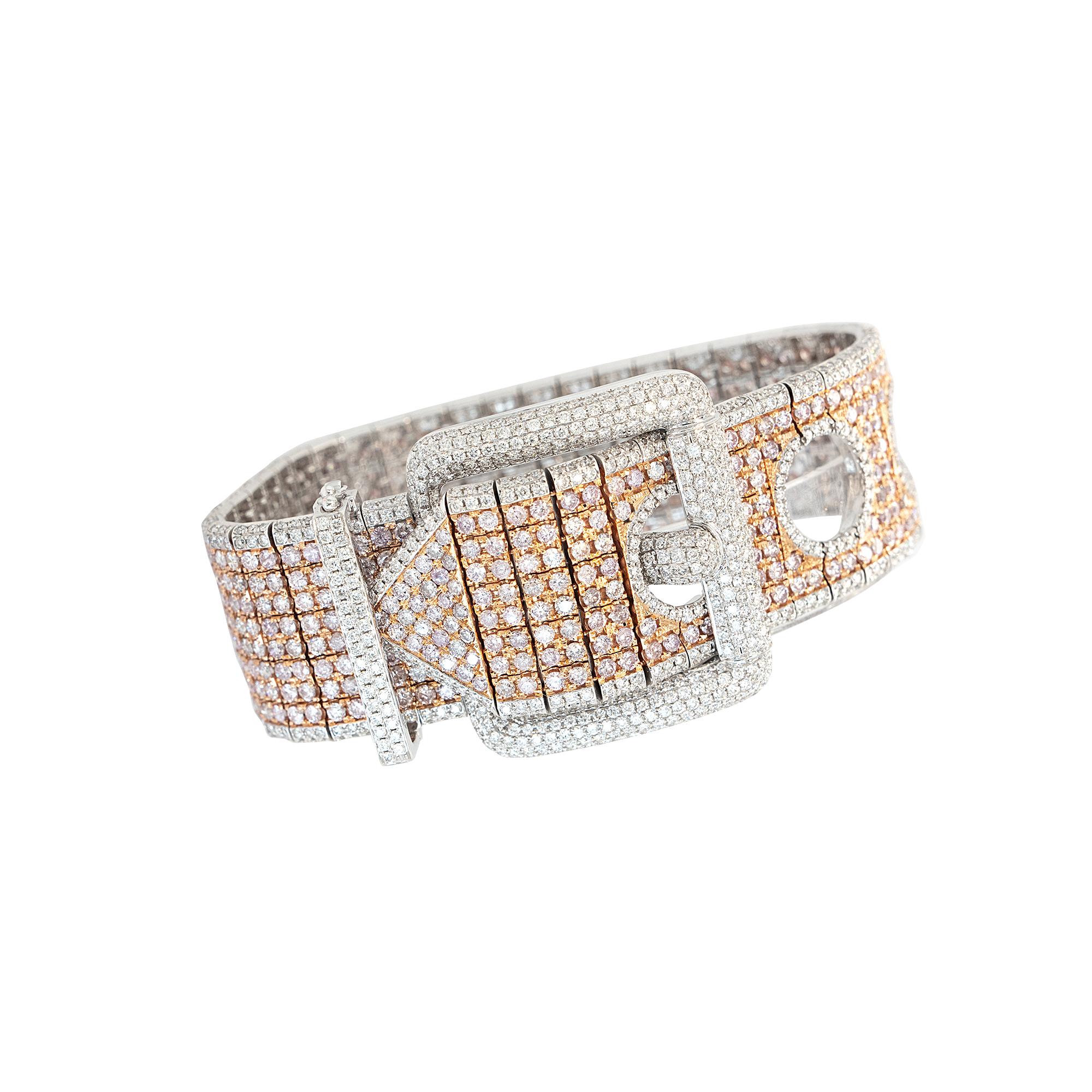Material: 18kt White and Rose Gold
Diamond Details:	
Apdiatw= 8.64cts
ApPnkdiatw= 20.31cts
Approx stones= 1626
Approx clarity natural pink  diamonds= SI
Approx clarity natural white  diamonds= SI
Approx natural white diamond  color=