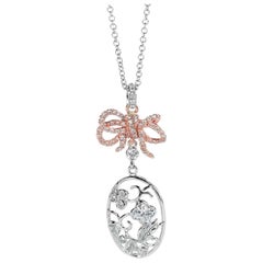 18KT Weiß- und Roségold Blumenanhänger mit Blumenschleife und Diamant 0,56 Karat insgesamt