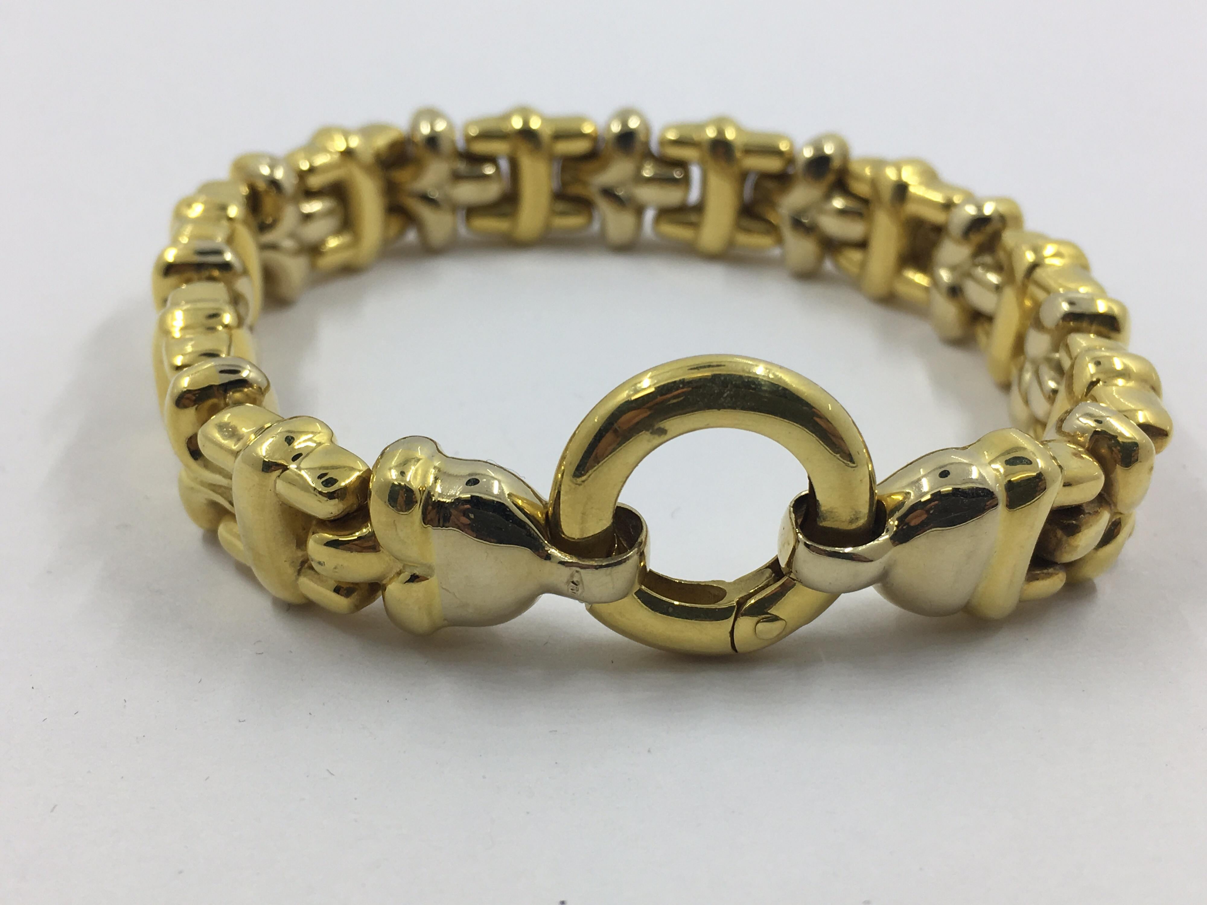 11-10134
bracelet à maillons en or blanc et jaune 18 Kt 
fabriqué en Italie 
32.60 grammes