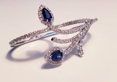 18 Karat White Gold 0.60 Blue Sapphires 0.90 White Diamond Two Fingers Ring