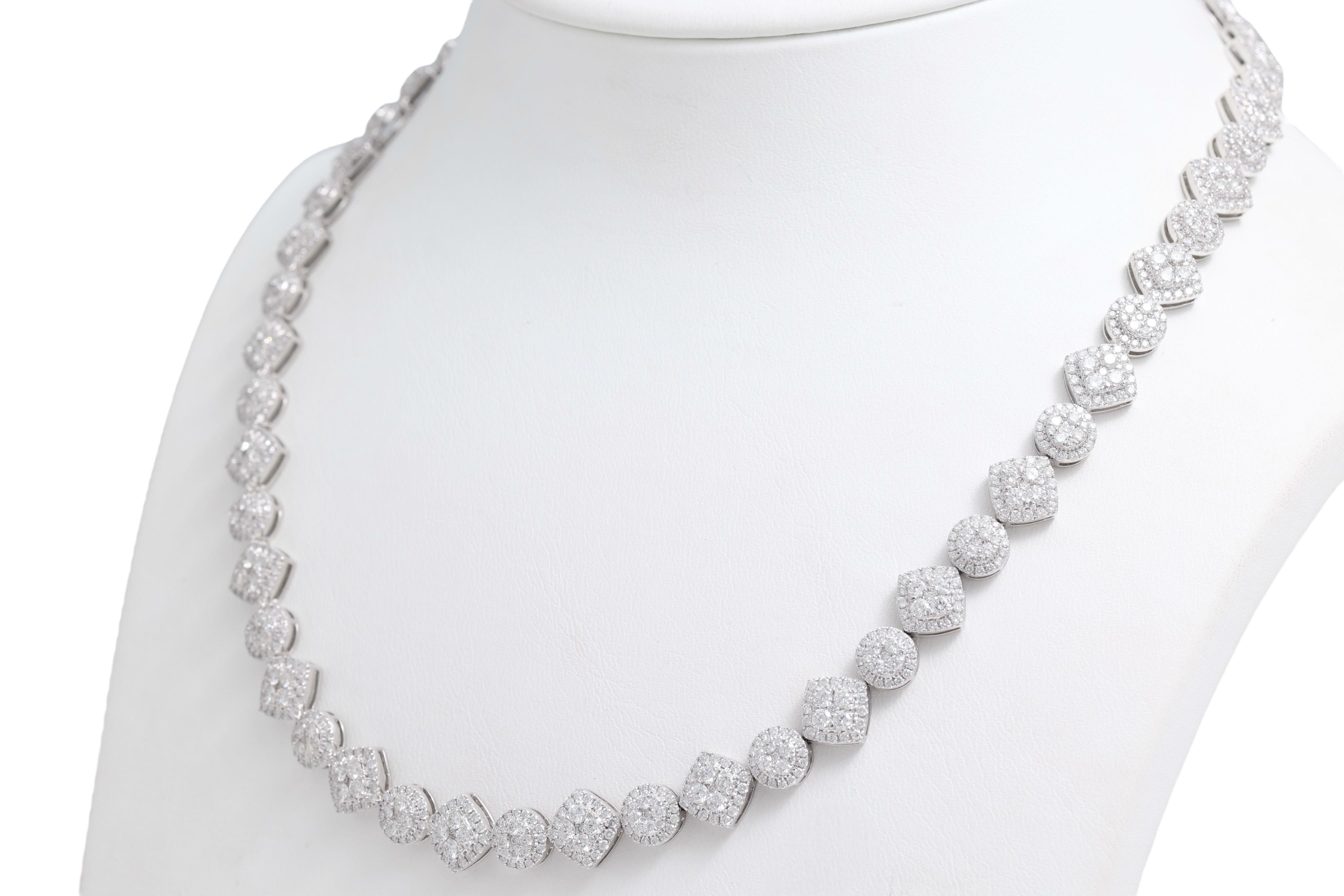 18kt White Gold Diamond Tennis Necklace, Can be purchased with the same beautiful Tennis Bracelet

Diamonds: 1242 Diamonds, Together 13.48ct, G/H VS

Material: 18 kt. white gold

Total weight: 44.9 gram / 1.585 oz / 28.9 dwt

Measurements: 45 cm
