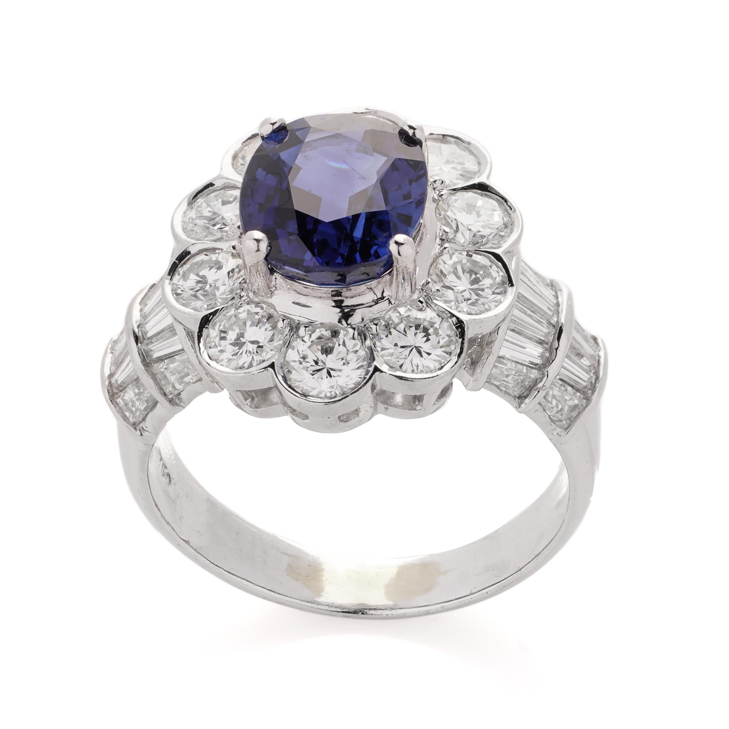 18kt White Gold 3.30 Carat Oval Blue Sapphire Cluster Ladies Ring with Diamonds For Sale 1