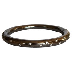 18kt White gold 29.70ct, Cuff bracelet, 17 White Diamonds 0.55ct, burnished