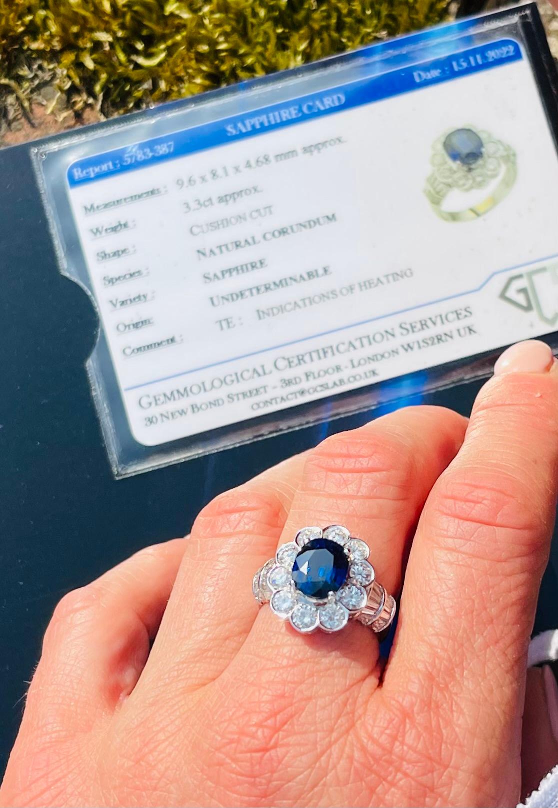 Oval Cut 18kt White Gold 3.30 Carat Oval Blue Sapphire Cluster Ladies Ring with Diamonds For Sale