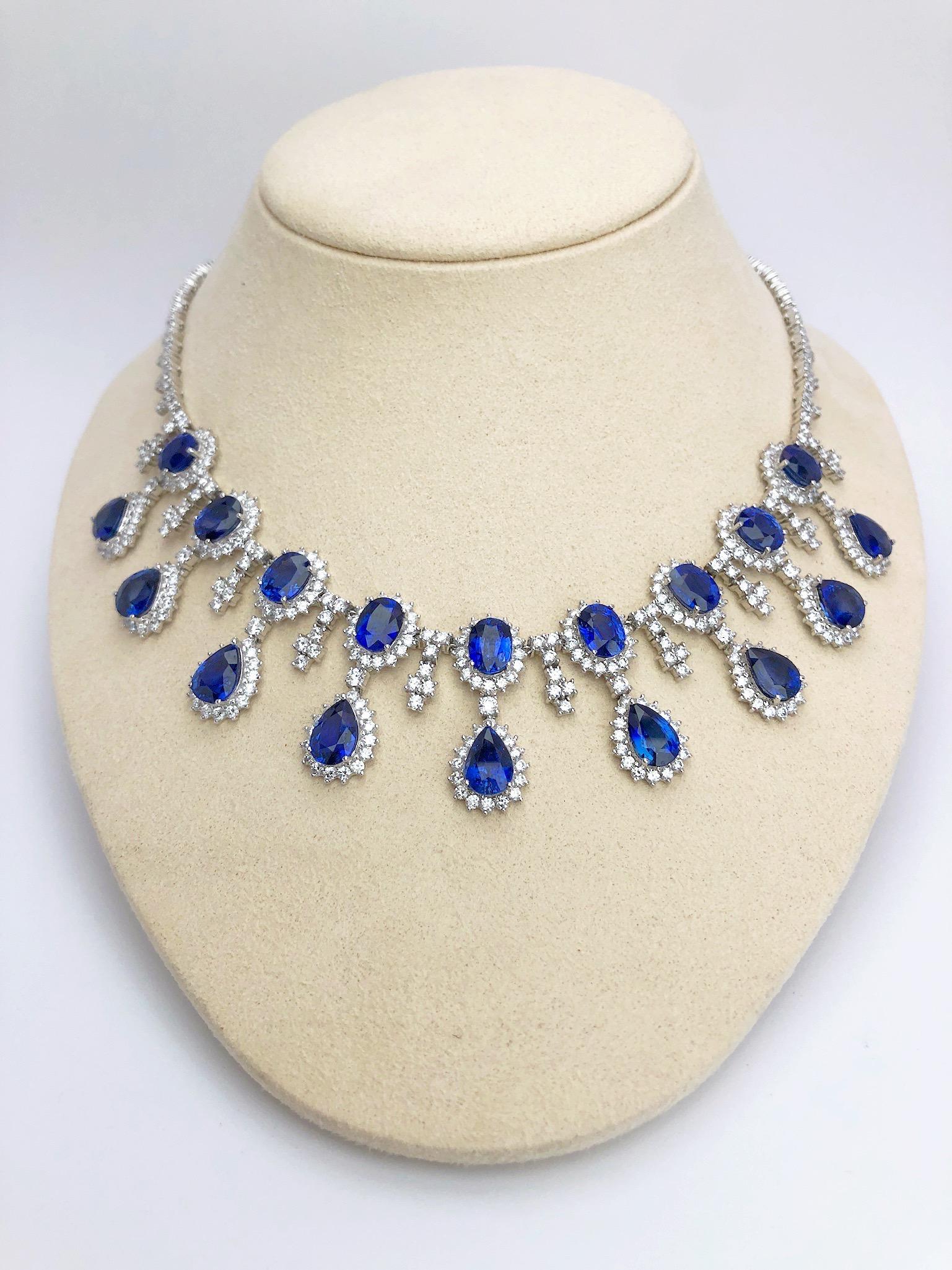 37.93 carats of oval and pear shape sapphires are framed with 12.89 carats of round brilliants in this show-stopping important necklace.
Set in 18-karat white gold.
508 Diamonds = 13.89 carats
18 Blue Sapphires = 37.93 carats
Total length