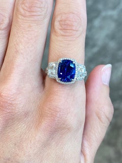 18KT White Gold 4.0 Carat Sapphire and Diamond Three-Stone Ring