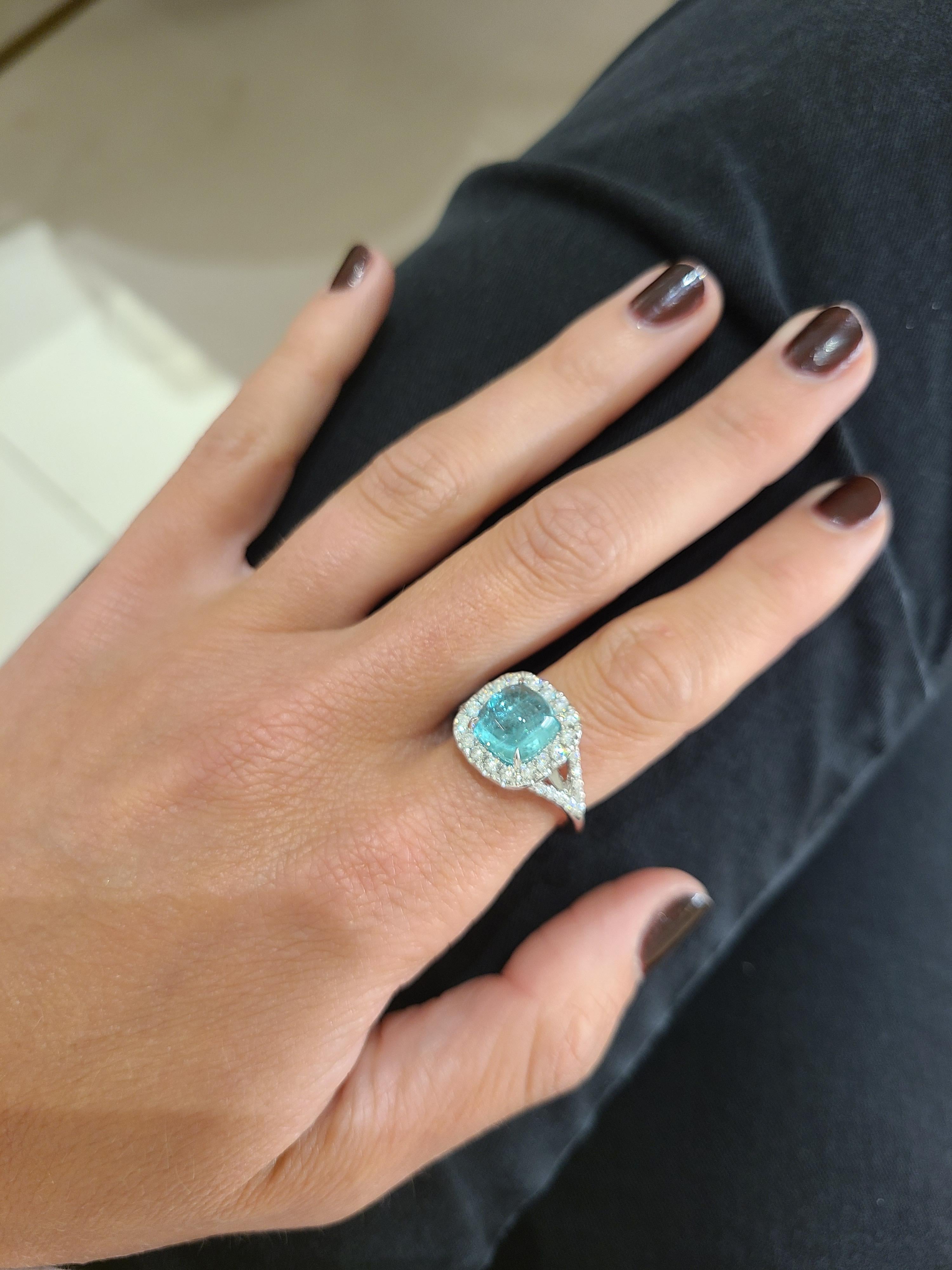 Women's or Men's 18kt White Gold 4.07ct. Cabochon Paraiba Tourmaline and 0.69ct. Diamond Ring