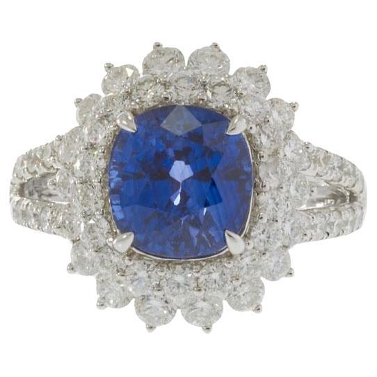 Bague en or blanc 18KT 4.89CT saphir et 2.14CT diamant Cluster