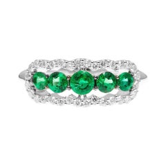 18kt White Gold 5-Stone Emerald Ring with Diamond Halo