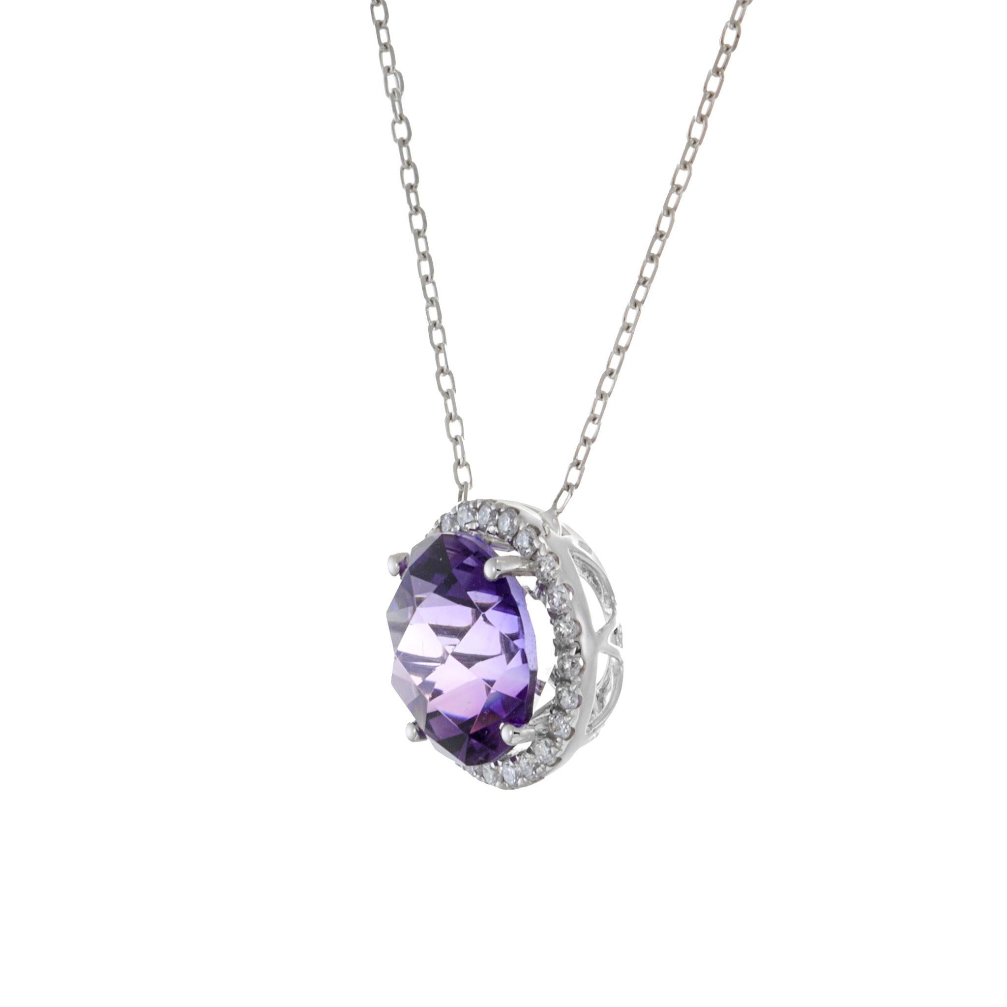 Introducing our elegant 18KT White Gold Pendant with a captivating Round Amethyst Center and Round Cut Diamonds. The amethyst weighs 2.83 carats, complemented by 0.17 carats of sparkling diamonds. Complete with a delicate chain, it's a perfect blend