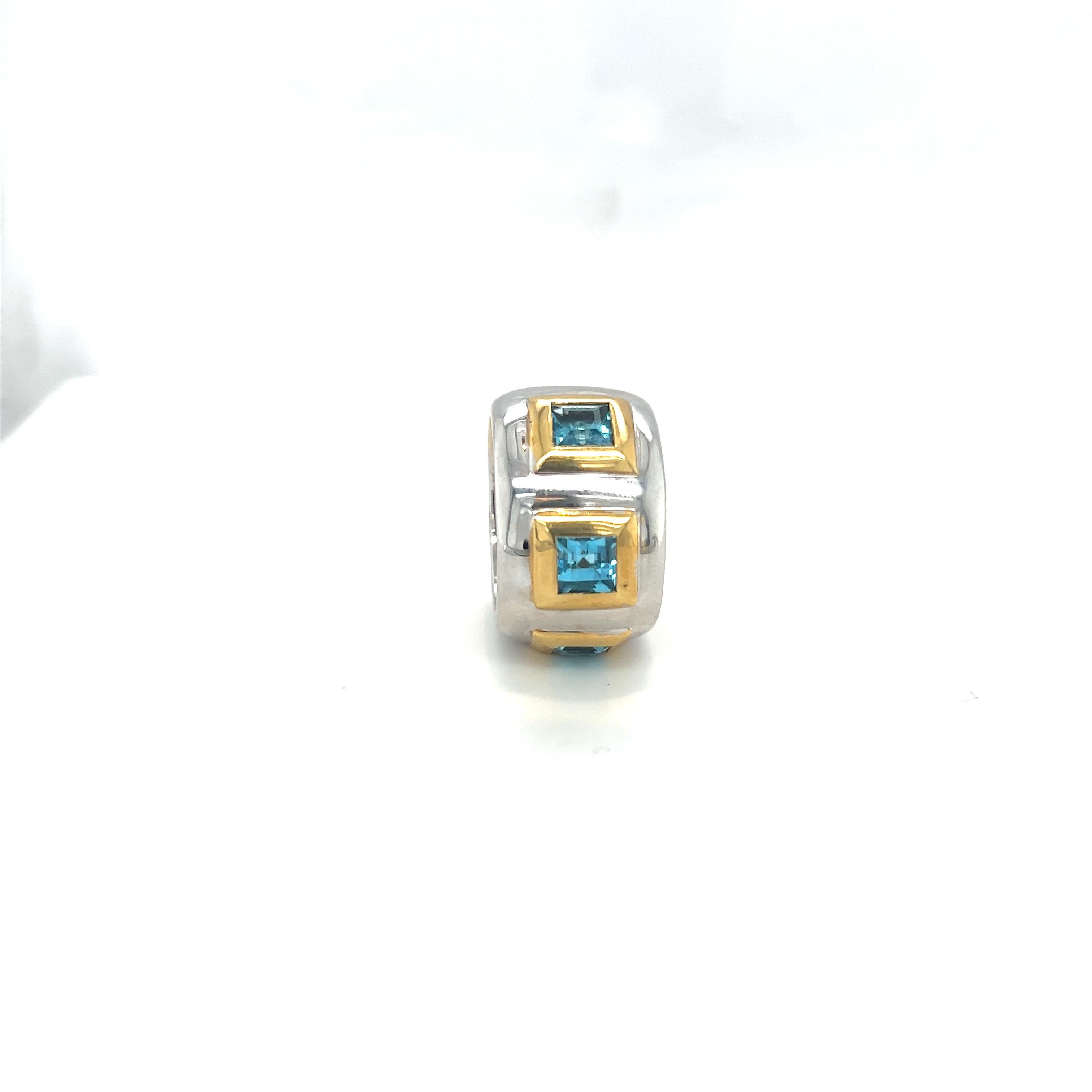 Emerald Cut 18KT White Gold and Blue Topaz Band Ring For Sale