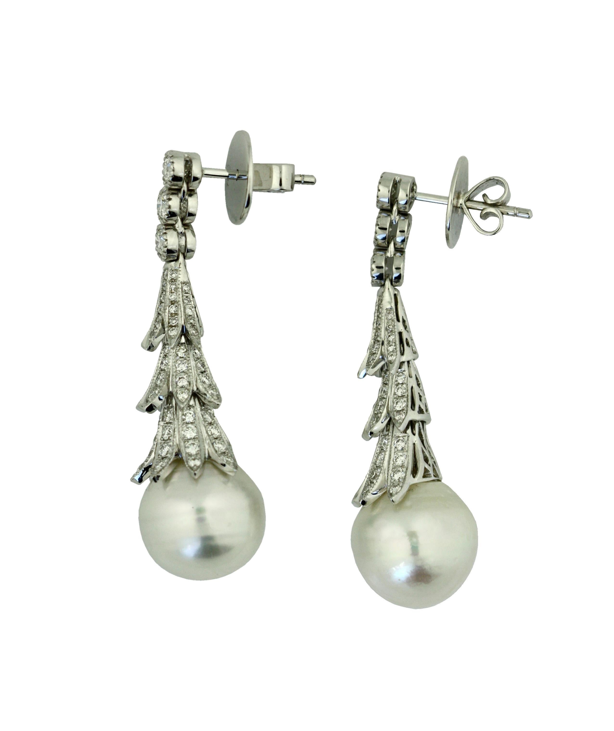 18KT WHITE GOLD, DIAMOND AND SOUTH SEA PEARL EARRINGS
pearls approx. 12.5mm, diamonds weighing approximately 3.25 carats
