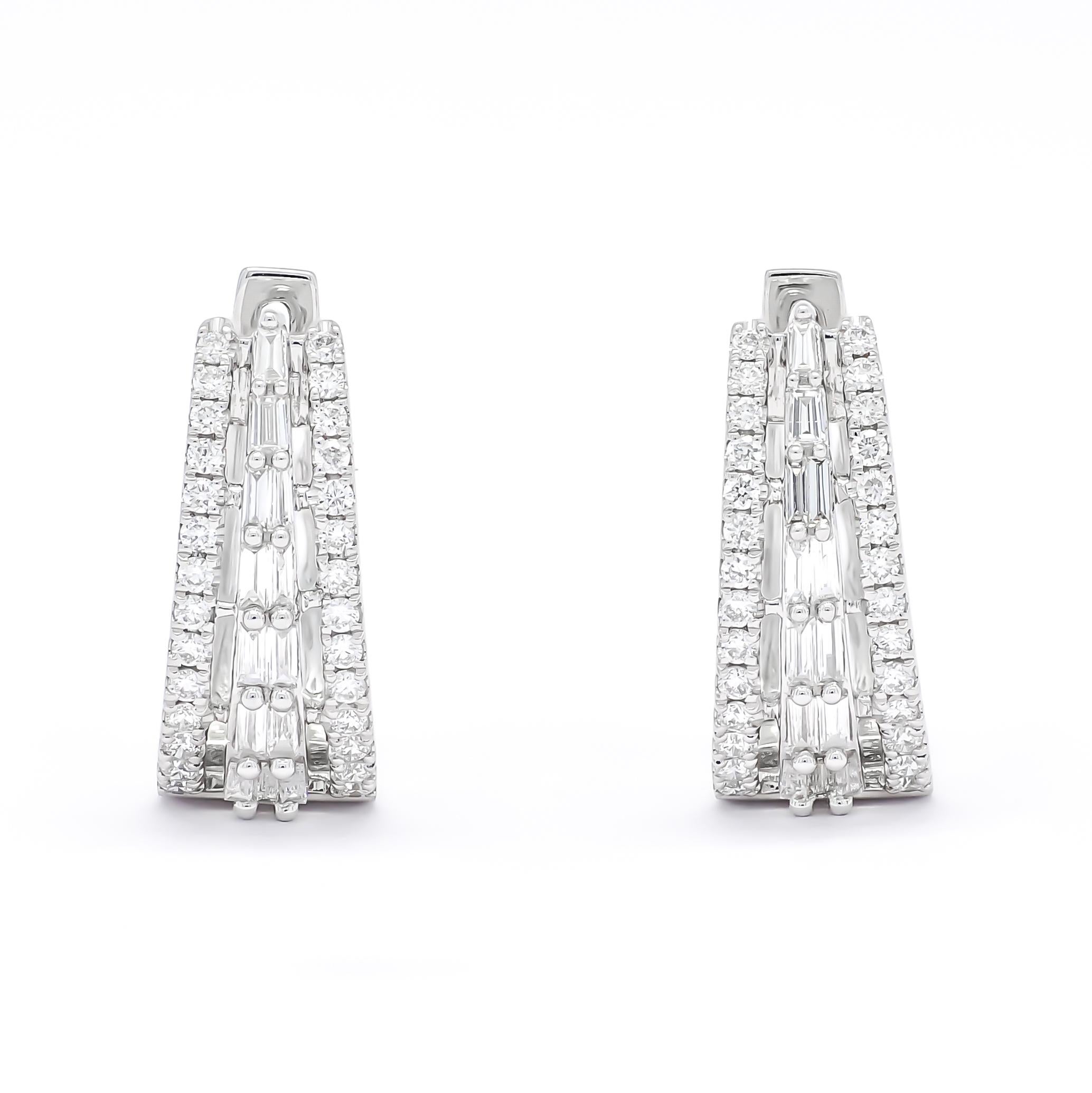 Elevate your style with sophistication and grace wearing these exquisite hoop earrings, adorned with brilliant baguette and shimmering round-cut diamonds set in gleaming 18 KT White Gold.

Totaling 0.74 carats, the diamonds in these designer hoops