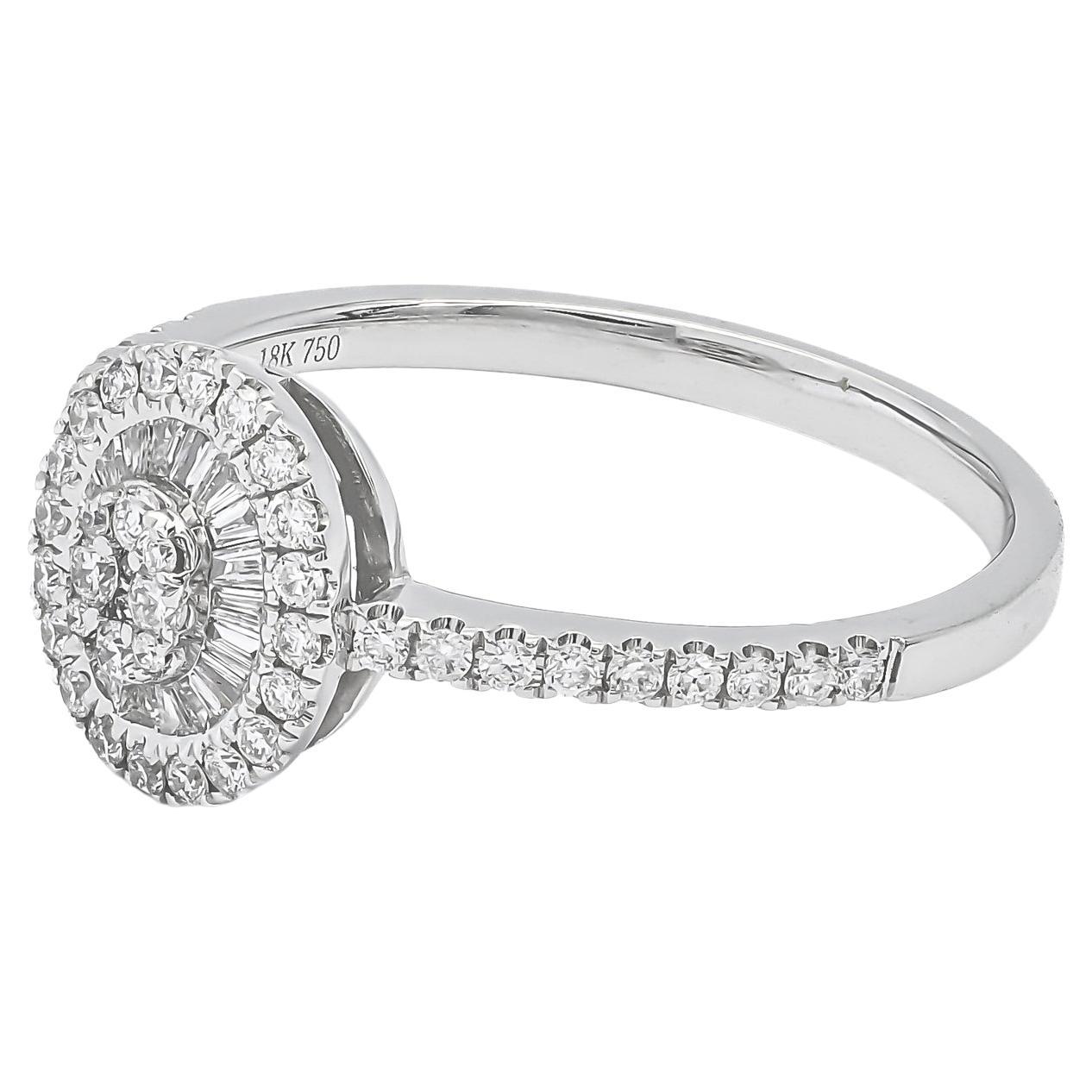 This exquisite engagement ring is crafted with a cluster of dazzling round cut diamonds set in a starburst pattern, beautifully accented by round brilliant and baguette diamonds with a beautiful delicate shank. 


Metal: 18kt White Gold
Weight:2.50