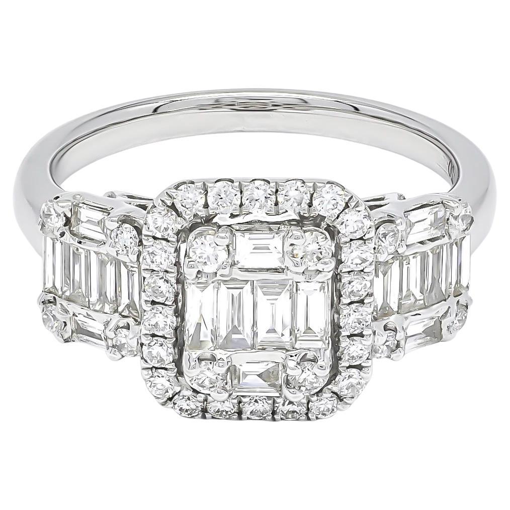 Ultra-modern and gorgeously glam, vow to sparkle with this uniquely elegant baguette and round-cut diamond engagement ring, artistically rendered in white gold. 

Let the fairytale begin with this stunning diamond engagement ring  composed of
