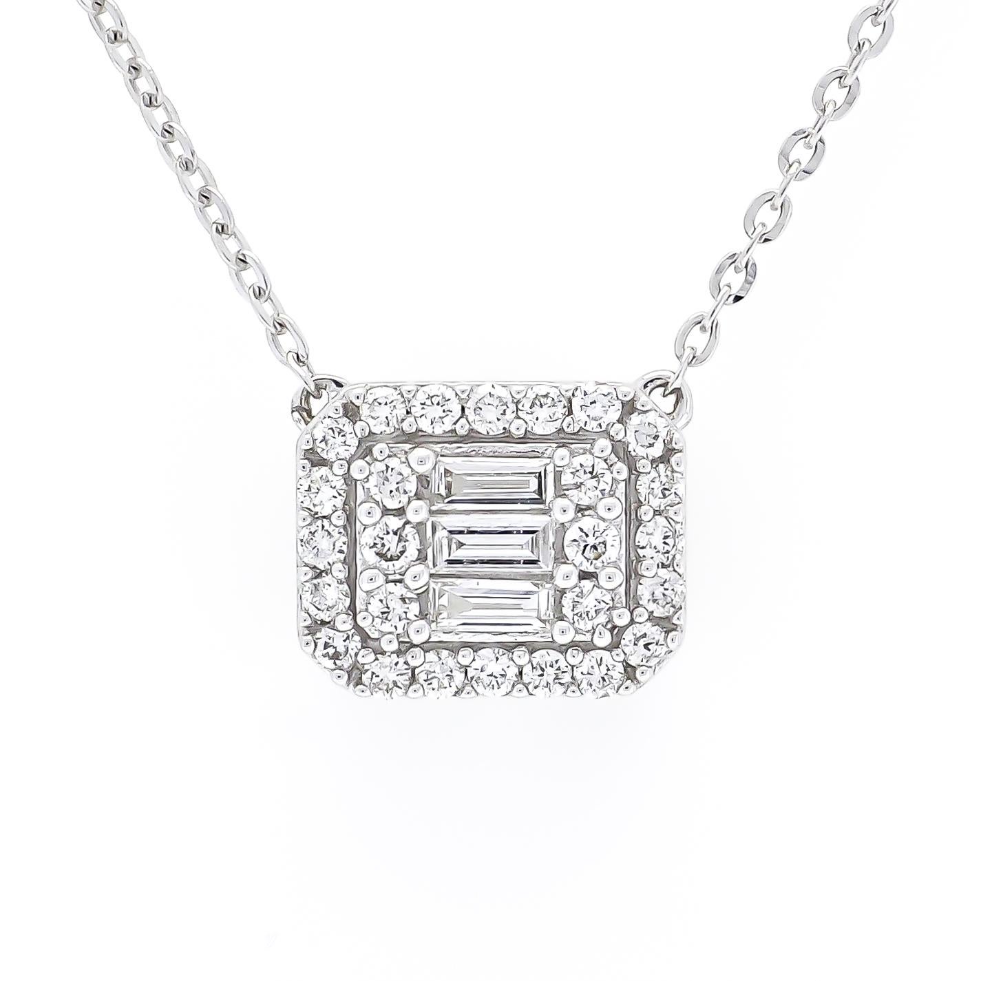 At its core, the pendant showcases a captivating cluster of baguette and round diamonds, meticulously arranged to create a stunning visual impact. The interplay of shapes and cuts adds depth and dimension to the design, while the brilliance of the
