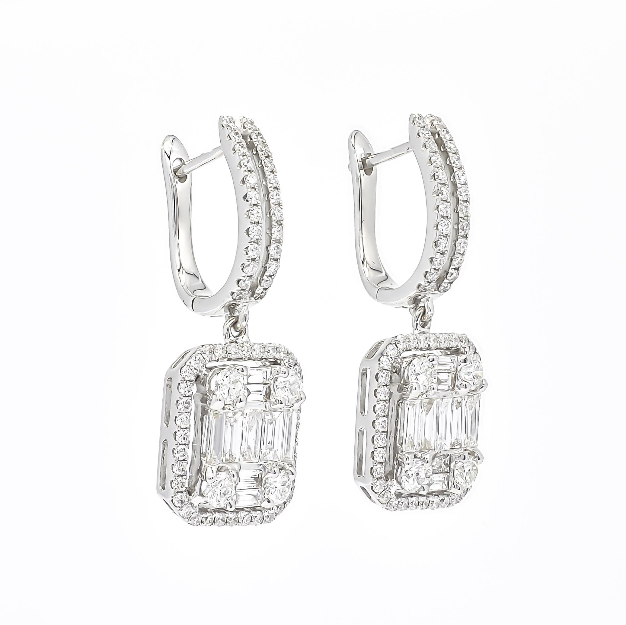 Artfully set in 18k white gold, this exquisite Earring features the soft shimmer of diamond baguette cluster setting with a halo gorgeously enhanced by hanging from Two Row Diamond Huggie. 

Elegance takes a bold turn with these extraordinary