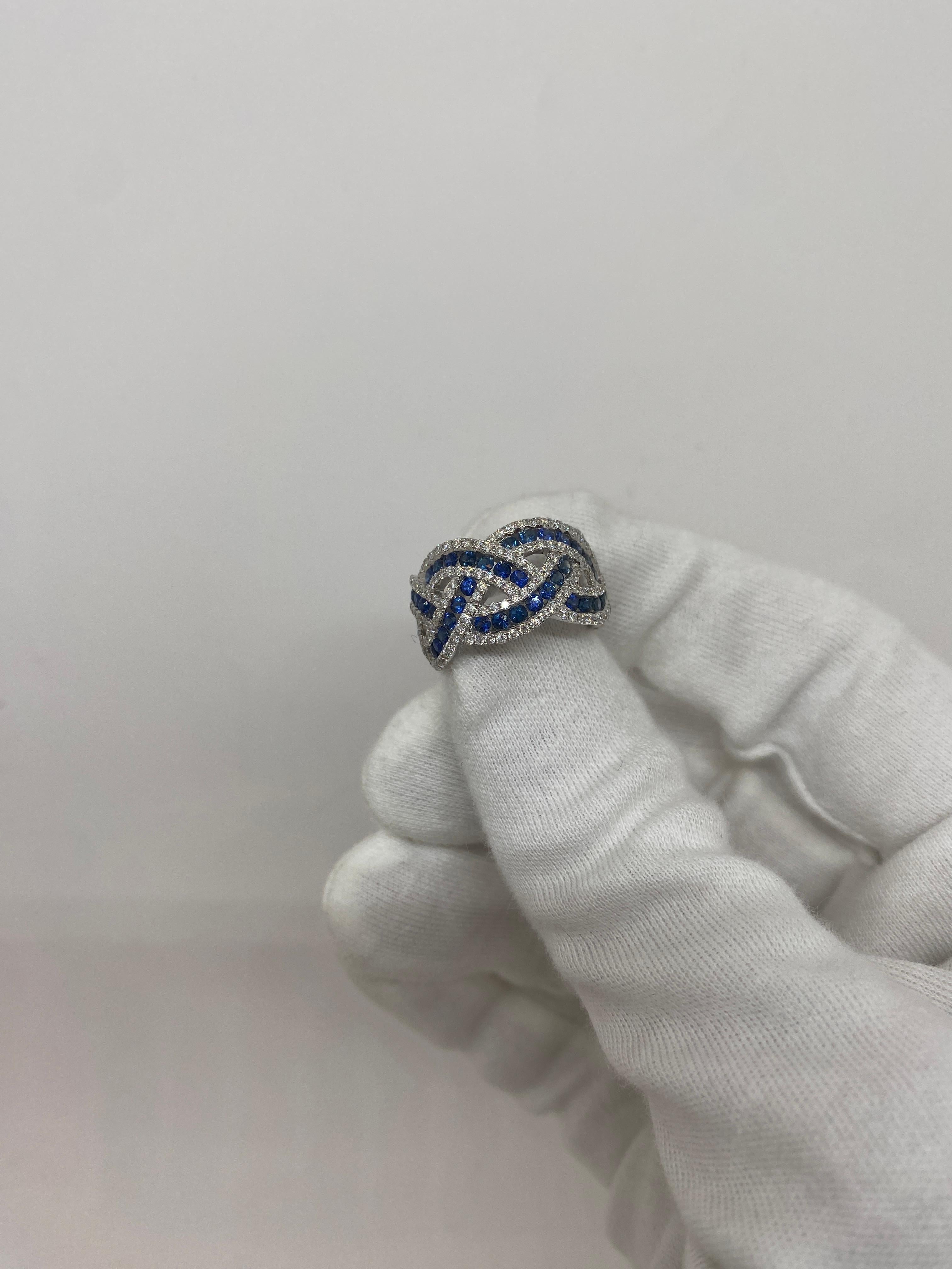 Band ring made of 18kt white gold with natural blue sapphires for ct.1.73 and natural white brilliant-cut diamonds for ct.1.07

Welcome to our Italian jewelry store, which has been in operation for over 100 years. Our passion for the art of jewelry