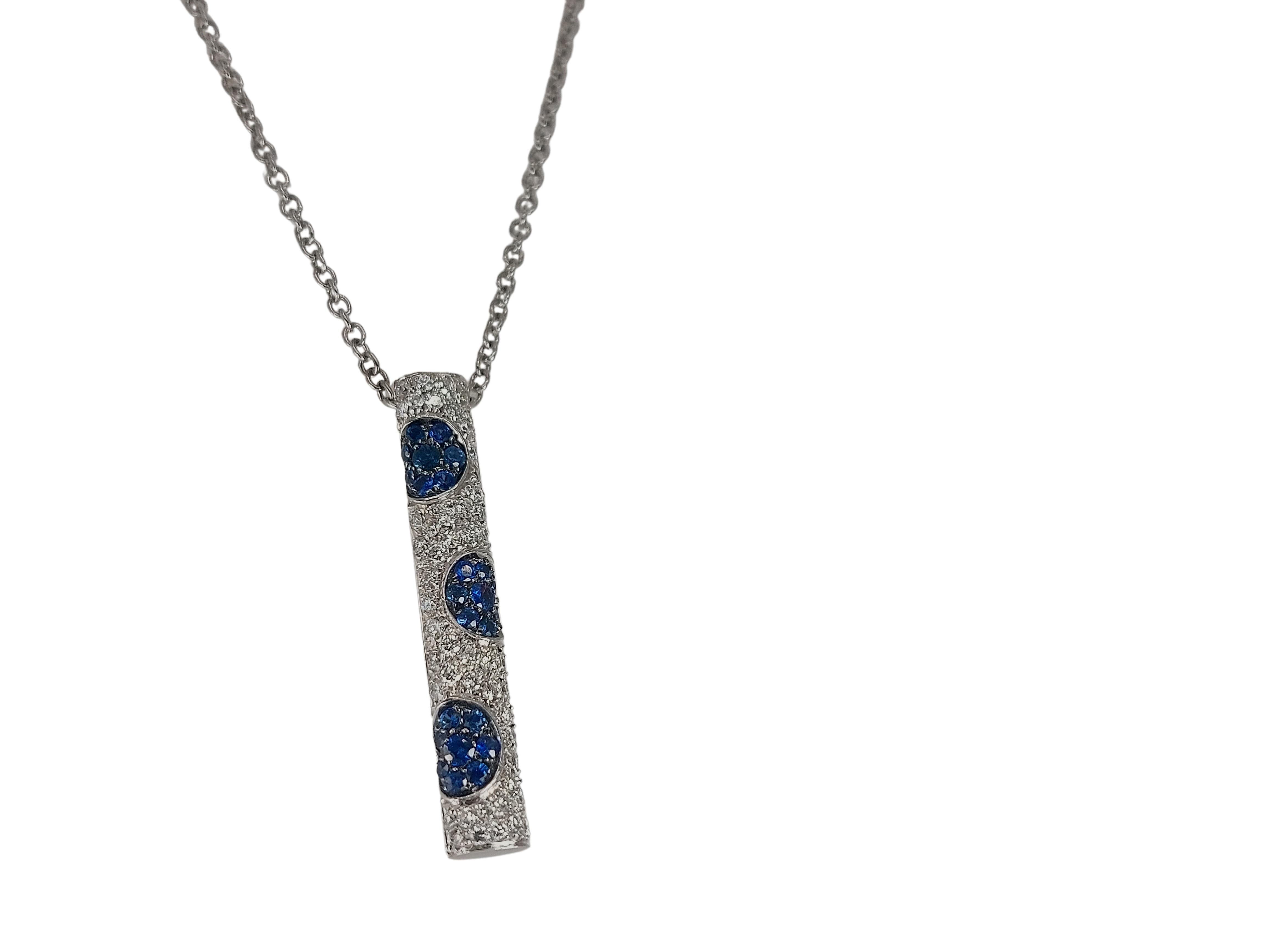 18kt White Gold Necklace With 1 ct Diamonds and 0.57ct Sapphires  

Can be purchased with matching Earrings as seen on photographs. 

Material: 18 kt white gold

Diamonds: Brilliant cut white diamonds together approx. 1ct

Sapphire: Blue sapphires