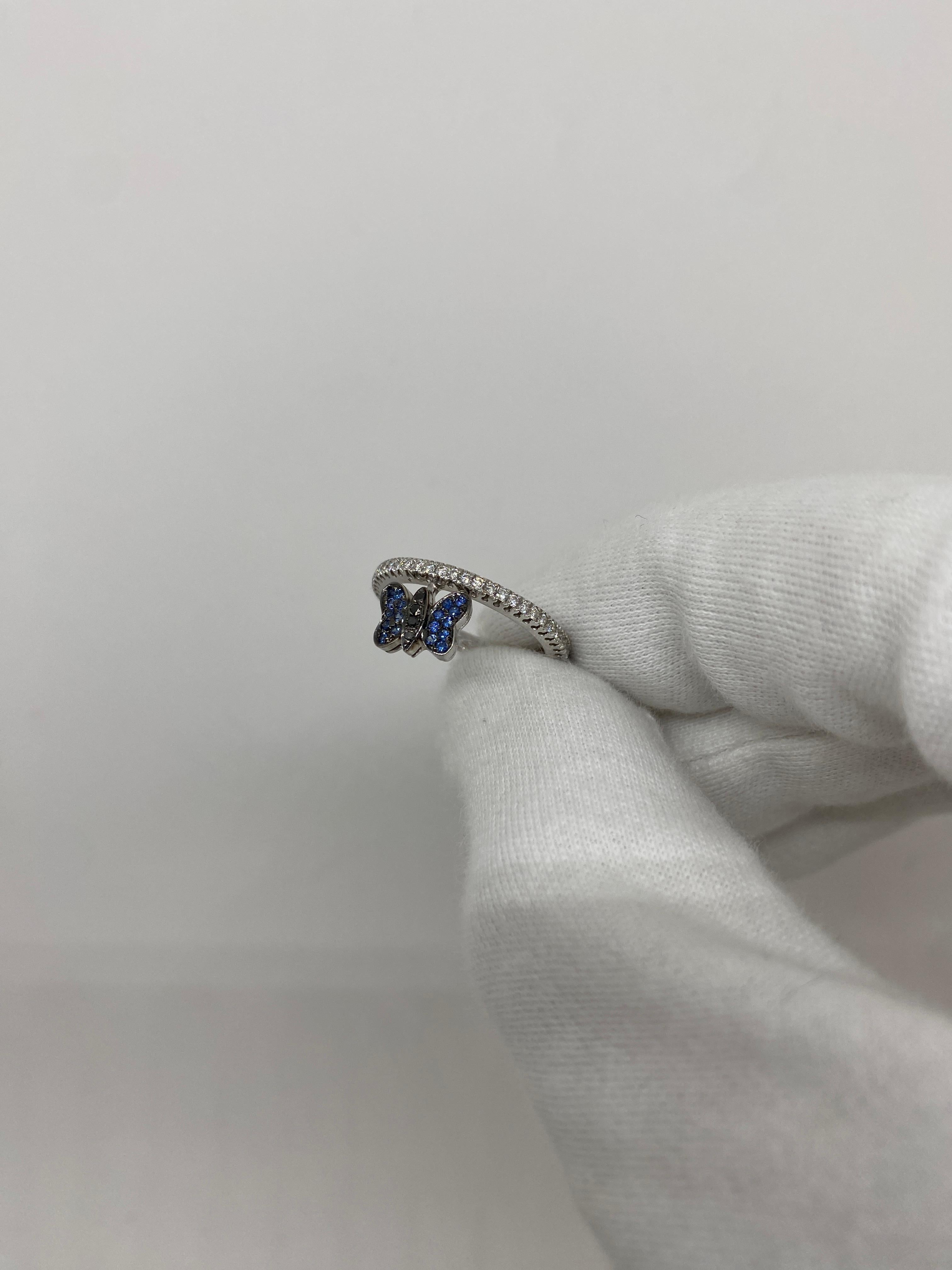 Brilliant Cut 18Kt White Gold Batterfly Ring Blue Sapphires White and Black Diamonds For Sale